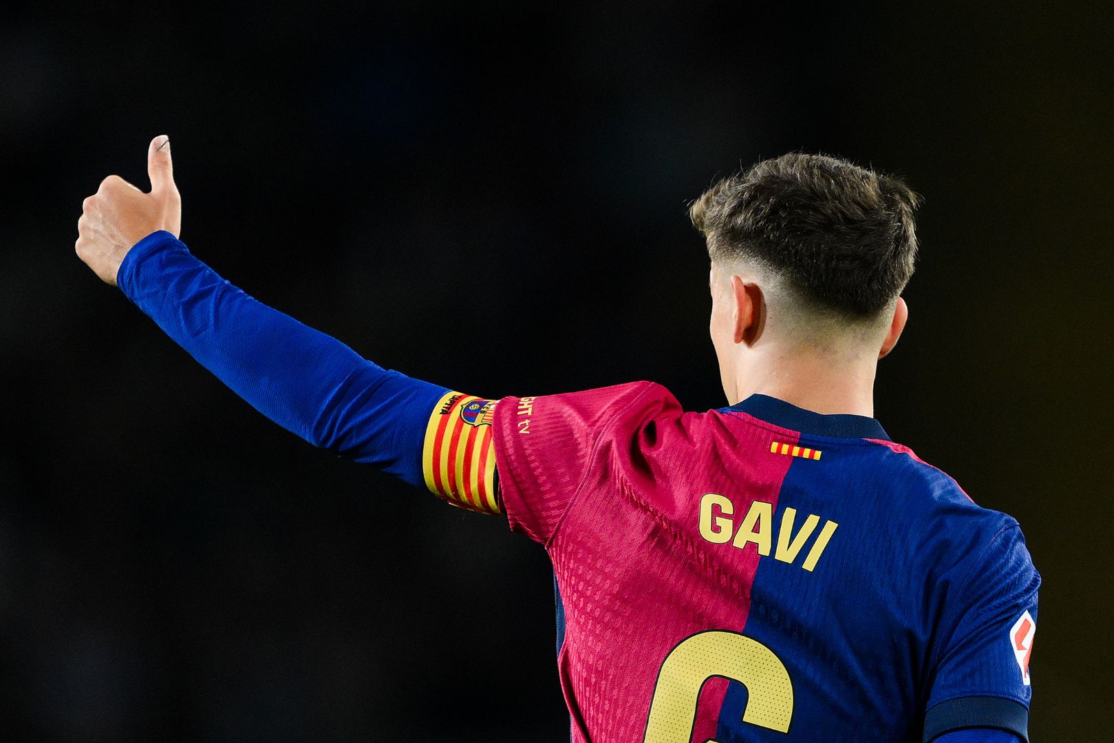 BARCELONA, SPAIN - OCTOBER 20: Gavi of FC Barcelona gives his thumbs upduring the La Liga EA Sports match between FC Barcelona and Sevilla FC at Estadi Olimpic Lluis Companys on October 20, 2024 in Barcelona, Spain.
