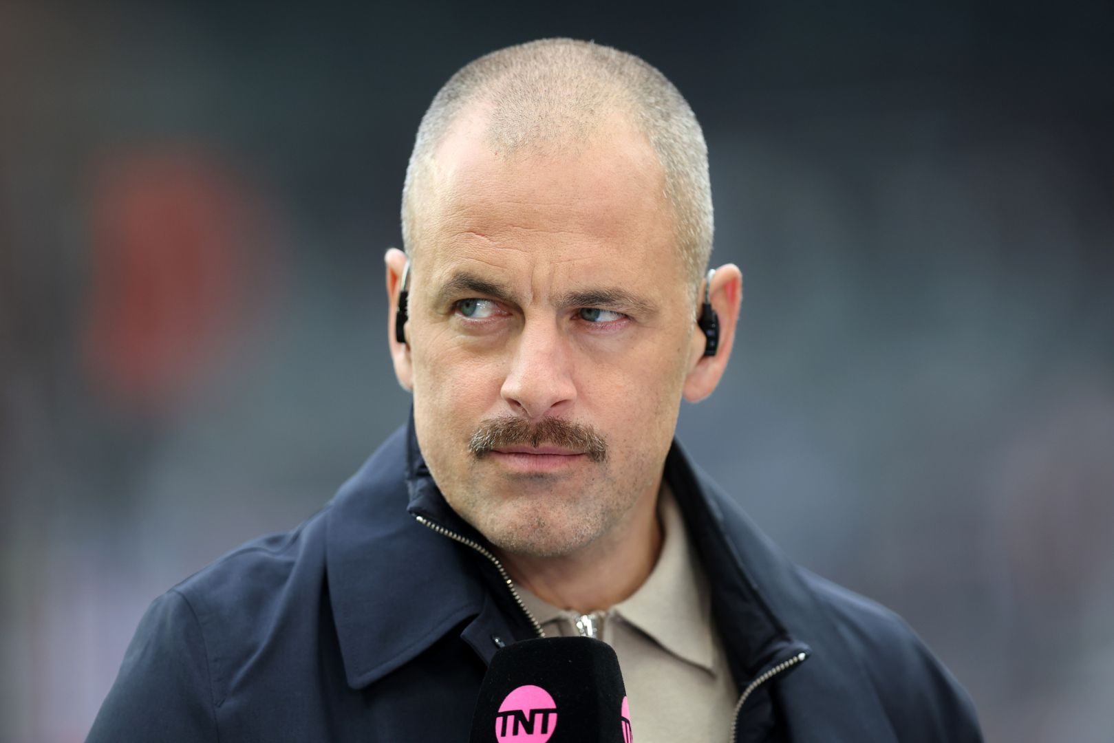 NEWCASTLE UPON TYNE, ENGLAND - NOVEMBER 02: Former footballer and pundit, Joe Cole looks on prior to the Premier League match between Newcastle United FC and Arsenal FC at St James' Park on November 02, 2024 in Newcastle upon Tyne, England.