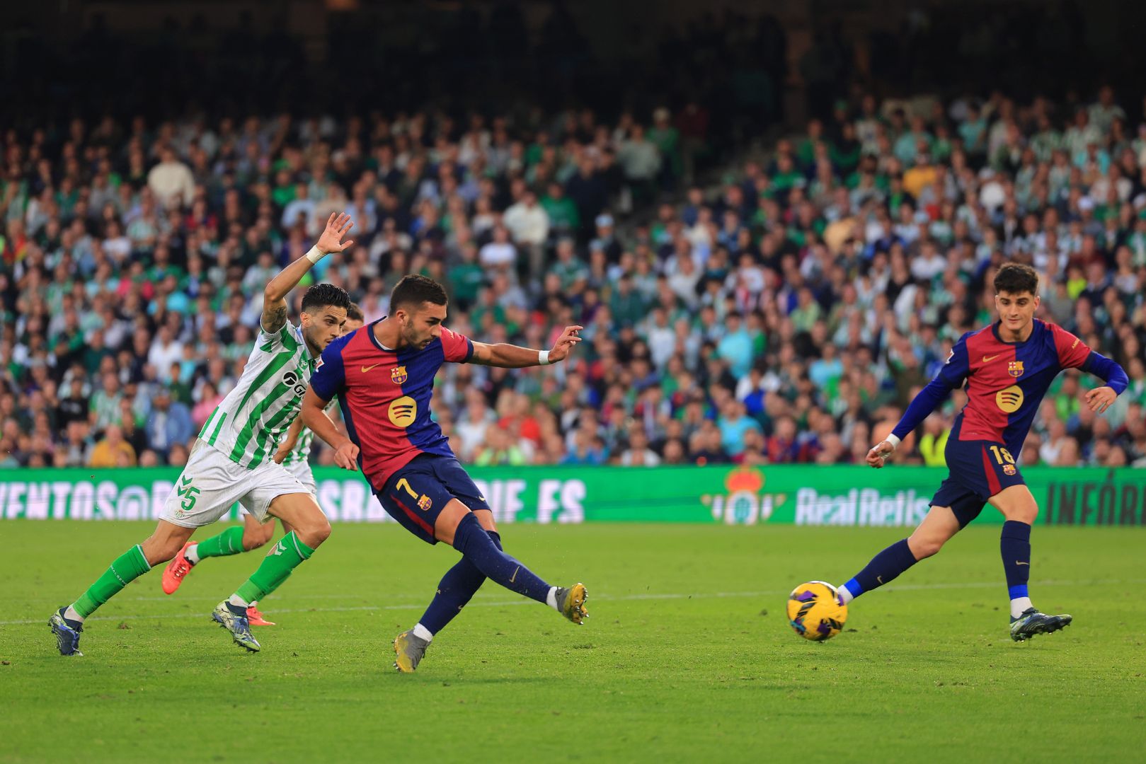 SEVILLE, SPAIN - DECEMBER 07: Ferran Torres of FC Barcelona scores his team's second goal during the LaLiga match between Real Betis Balompie and FC Barcelona at Estadio Benito Villamarin on December 07, 2024 in Seville, Spain.