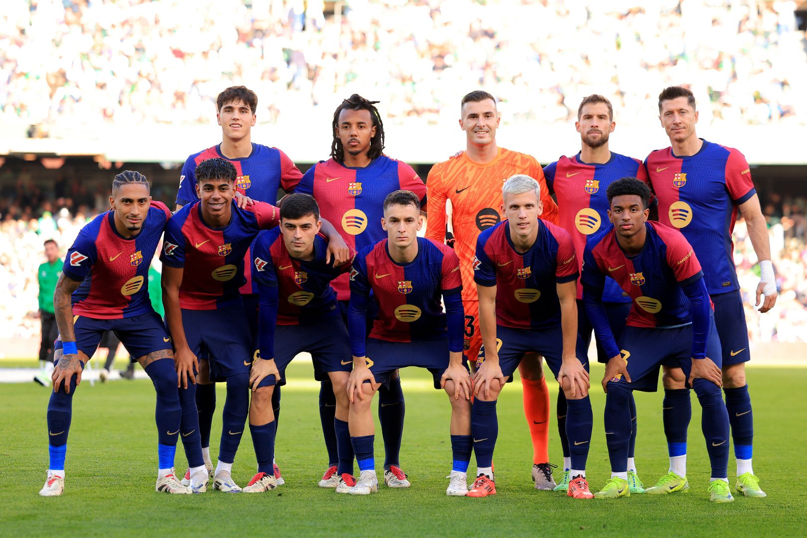 SEVILLE, SPAIN - DECEMBER 07: Players of FC Barcelona pose for a team photo prior to the LaLiga match between Real Betis Balompie and FC Barcelona at Estadio Benito Villamarin on December 07, 2024 in Seville, Spain.