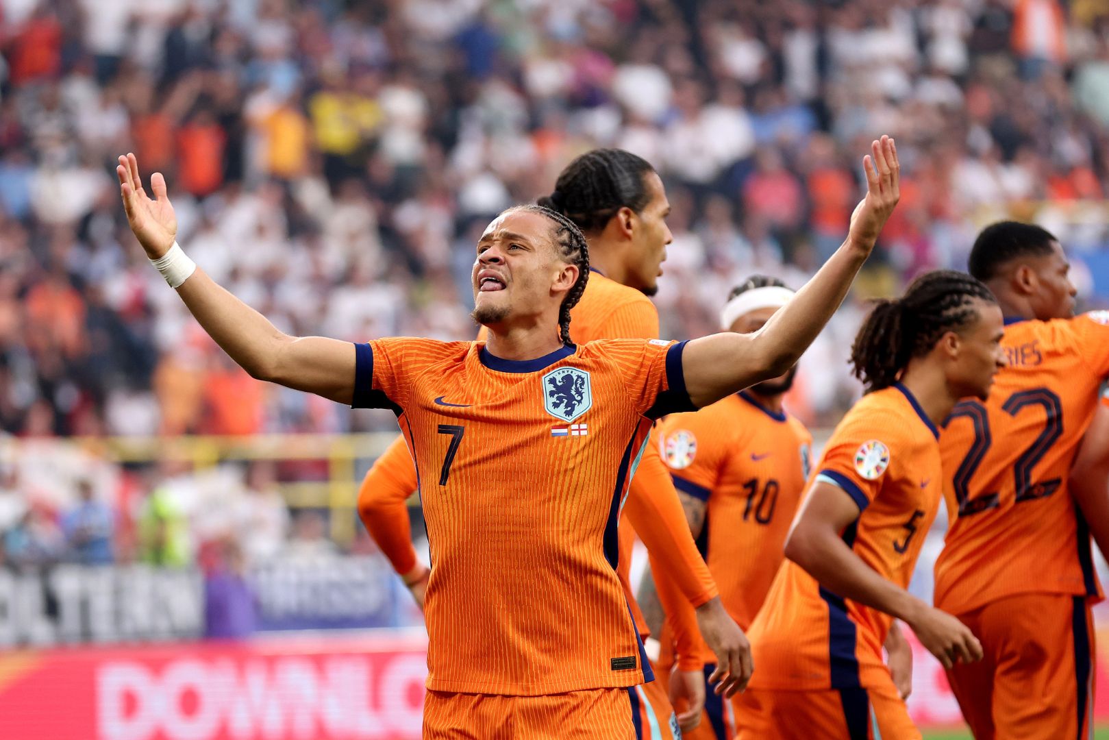DORTMUND, GERMANY - JULY 10: Xavi Simons of the Netherlands celebrates scoring his team's first goal with teammates during the UEFA EURO 2024 semi-final match between Netherlands and England at Football Stadium Dortmund on July 10, 2024 in Dortmund, Germany.