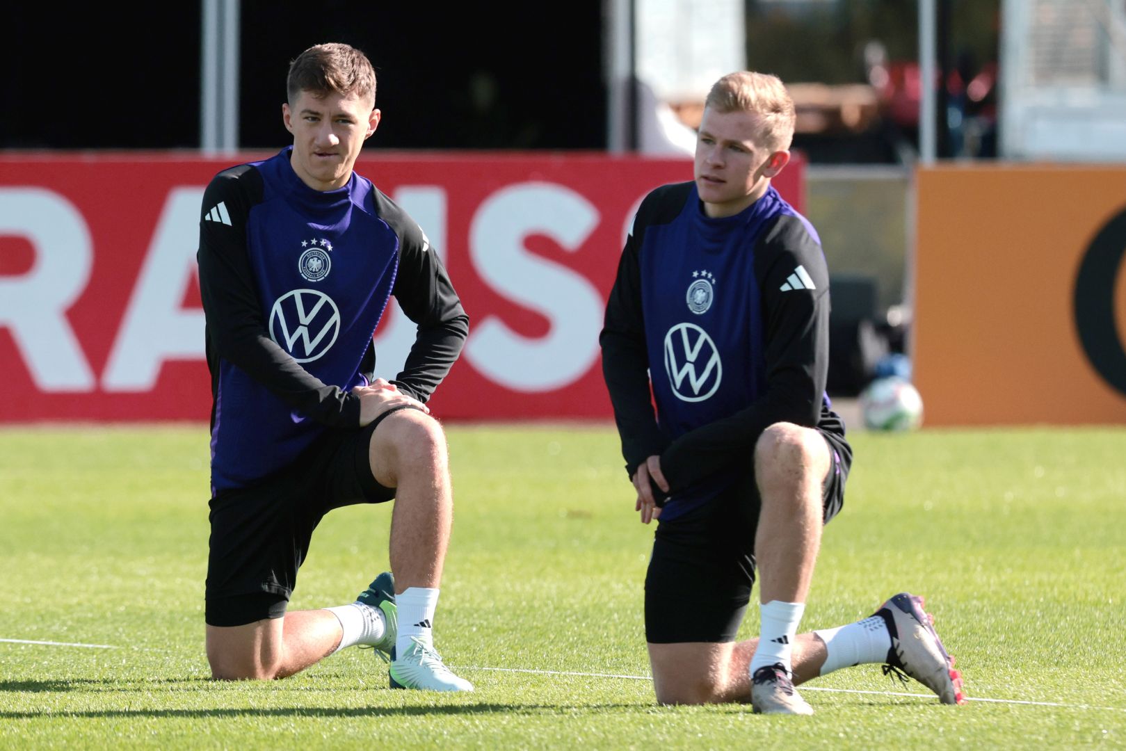 HERZOGENAURACH, GERMANY - OCTOBER 09: Angelo Stiller and Jonathan Burkardt warm up during a training session of the German national soccer team ahead of their Nations League match against Bosnia and Herzegovina at adidas Homeground on October 09, 2024 in Herzogenaurach, Germany.