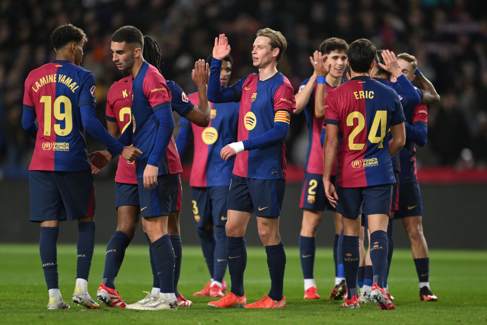 BARCELONA, SPAIN - JANUARY 26: Fermin Lopez of FC Barcelona celebrates scoring his team's fifth goal with teammates during the LaLiga match between FC Barcelona and Valencia CF at Estadi Olimpic Lluis Companys on January 26, 2025 in Barcelona, Spain.