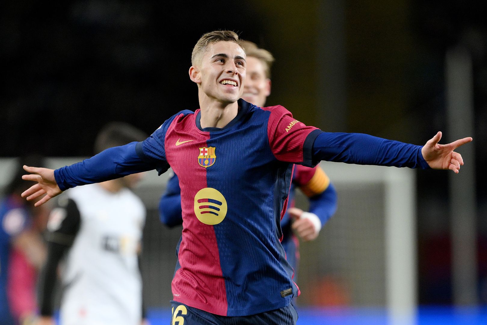BARCELONA, SPAIN - JANUARY 26: Fermin Lopez of FC Barcelona celebrates scoring his team's fourth goal during the LaLiga match between FC Barcelona and Valencia CF at Estadi Olimpic Lluis Companys on January 26, 2025 in Barcelona, Spain.