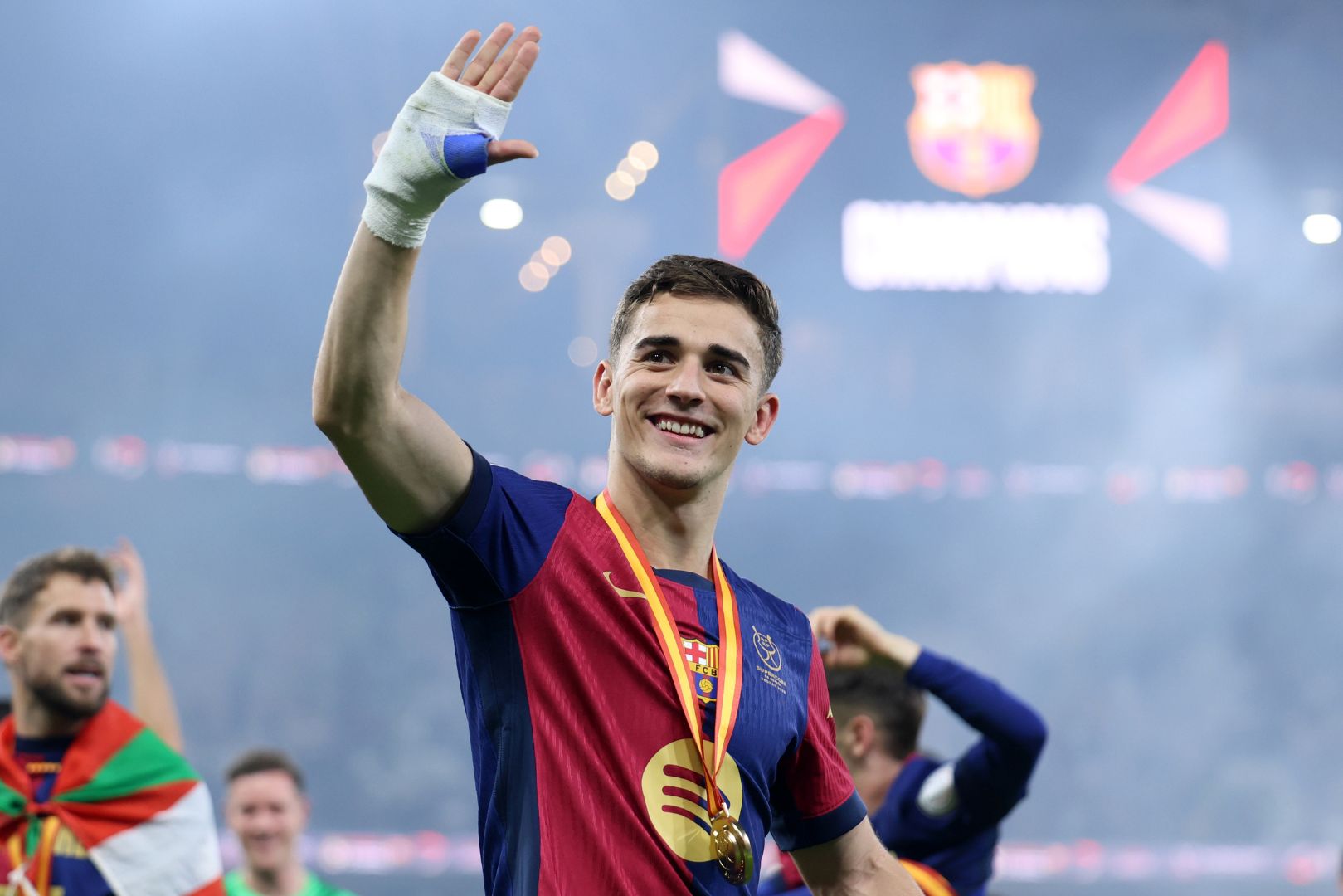 JEDDAH, SAUDI ARABIA - JANUARY 12: Gavi of FC Barcelona acknowledges the fans during the trophy presentation following the Spanish Super Cup Final between Real Madrid and FC Barcelona at King Abdullah Sports City on January 12, 2025 in Jeddah, Saudi Arabia.