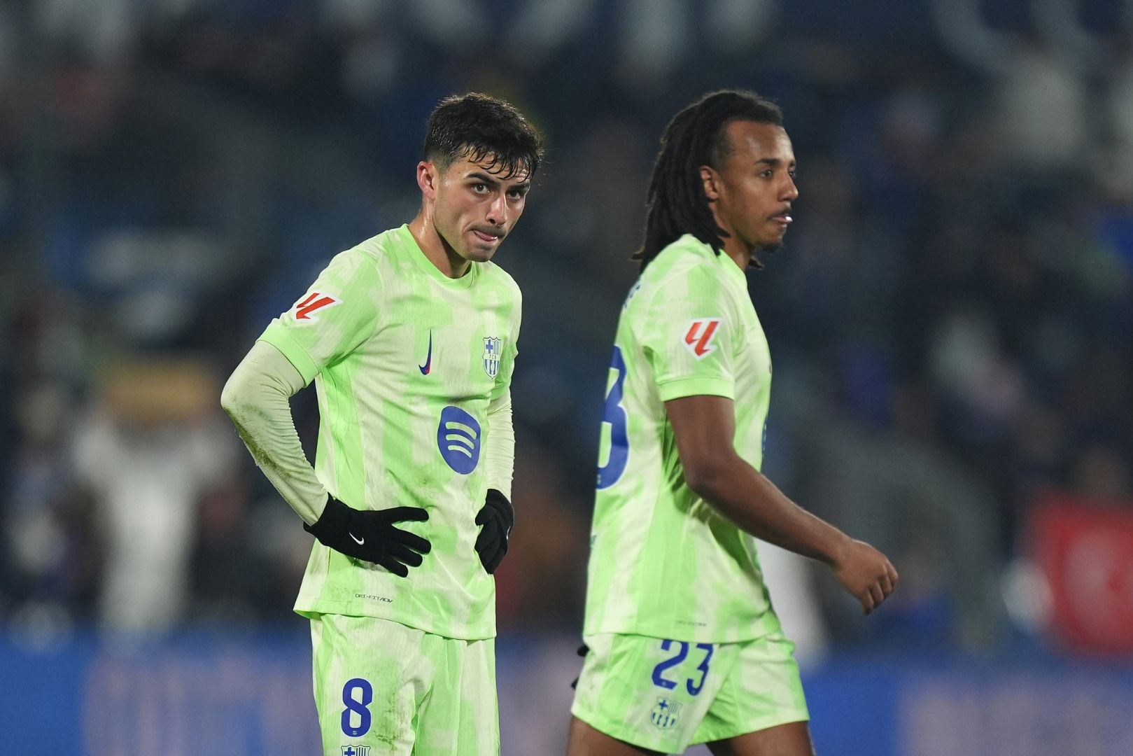 GETAFE, SPAIN - JANUARY 18: Pedri (L) and Jules Kounde of FC Barcelona look on during the LaLiga match between Getafe CF and FC Barcelona at Coliseum Alfonso Perez on January 18, 2025 in Getafe, Spain.