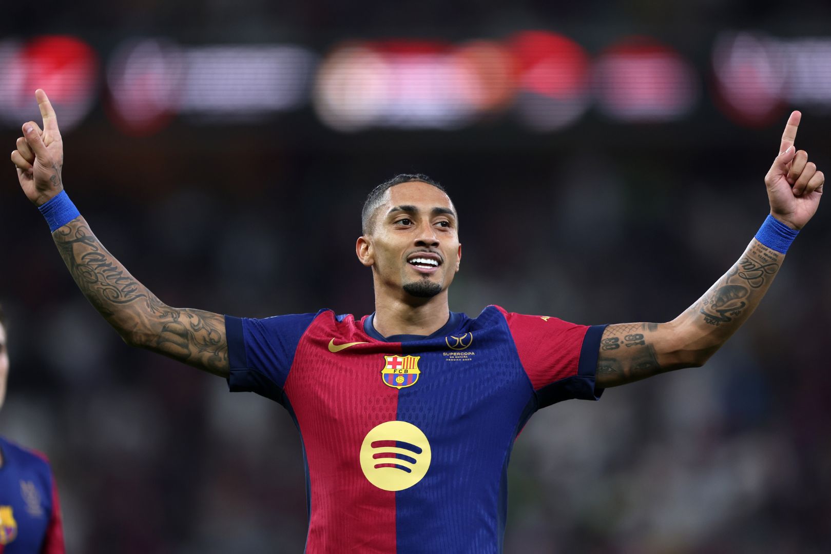 JEDDAH, SAUDI ARABIA - JANUARY 12: Raphinha of FC Barcelona celebrates scoring his team's fifth goal during the Spanish Super Cup Final between Real Madrid and FC Barcelona at King Abdullah Sports City on January 12, 2025 in Jeddah, Saudi Arabia.