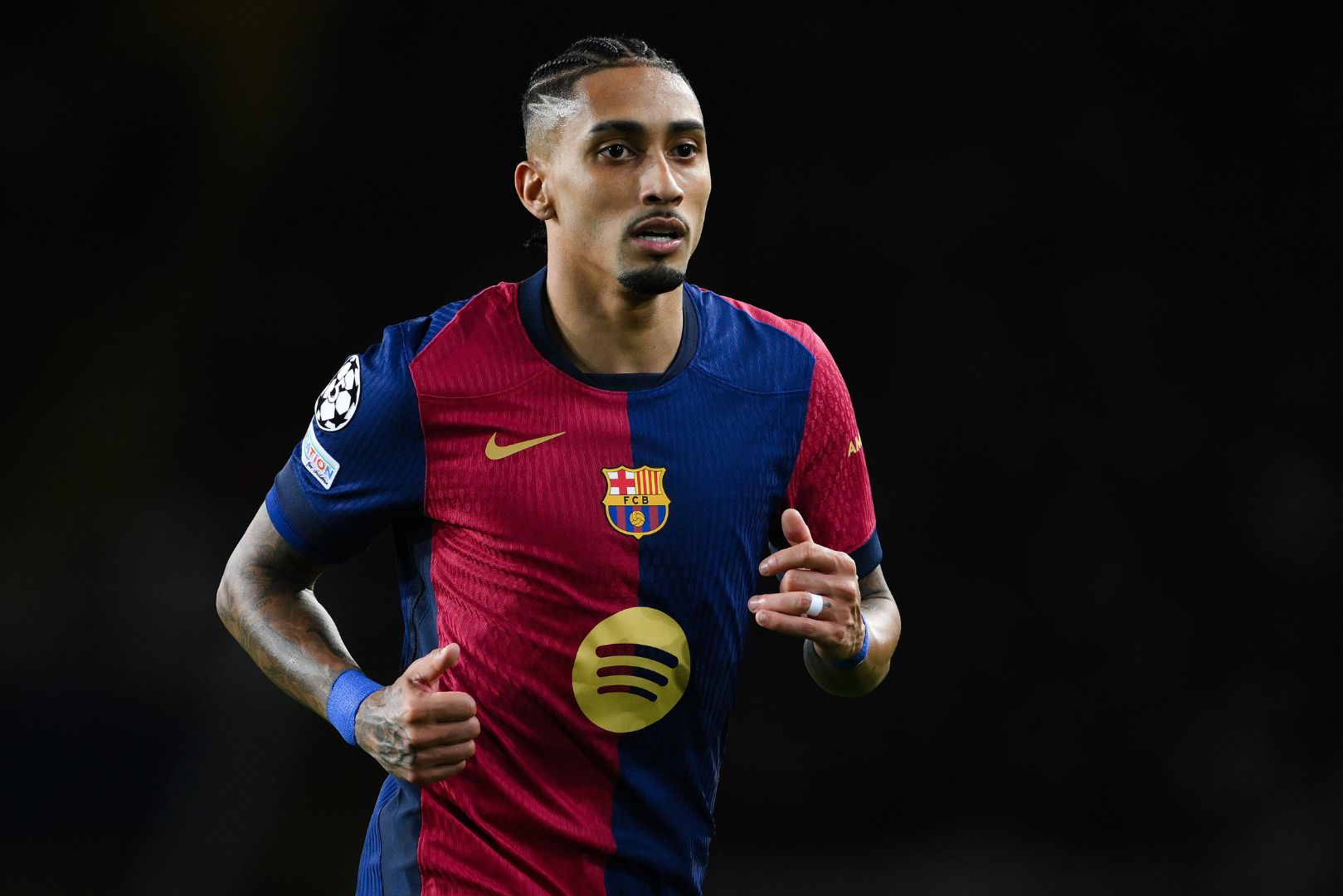 BARCELONA, SPAIN - JANUARY 29: Raphinha of FC Barcelona looks on during the UEFA Champions League 2024/25 League Phase MD8 match between FC Barcelona and Atalanta BC at Estadi Olimpic Lluis Companys on January 29, 2025 in Barcelona, Spain.