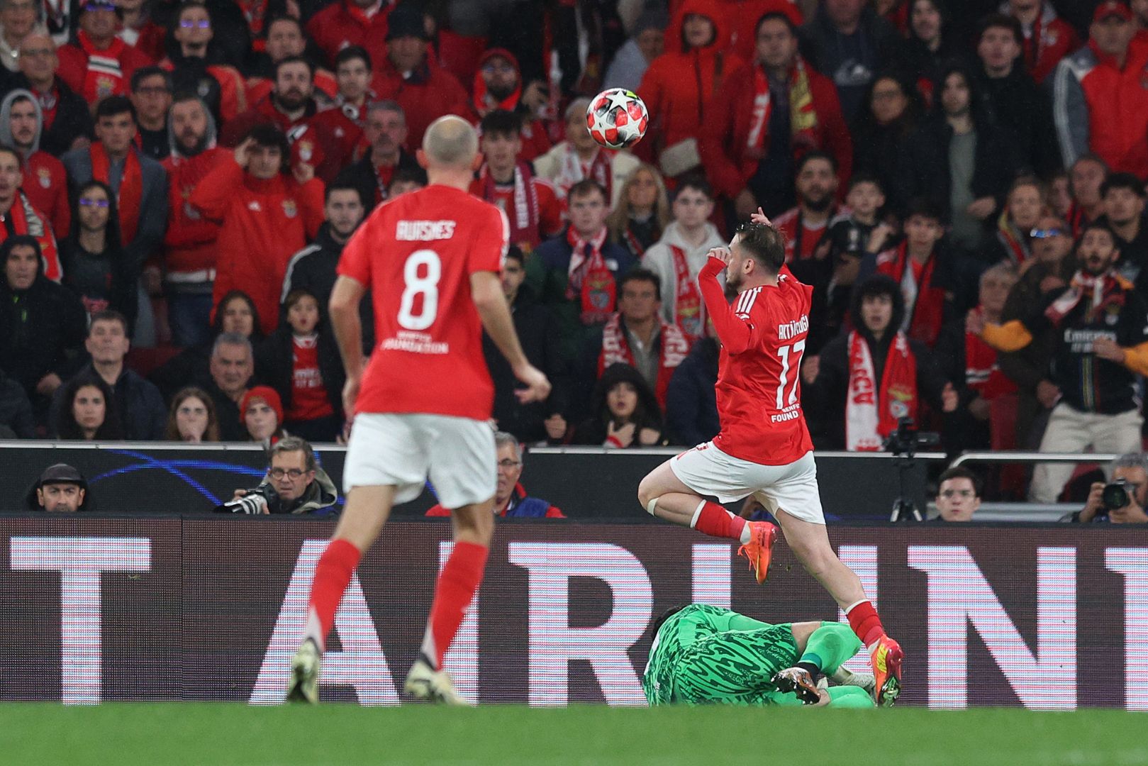 LISBON, PORTUGAL - JANUARY 21: Wojciech Szczesny of FC Barcelona tackles Kerem Akturkoglu of S.L Benfica during the UEFA Champions League 2024/25 League Phase MD7 match between SL Benfica and FC Barcelona at Estadio do SL Benfica on January 21, 2025 in Lisbon, Portugal.