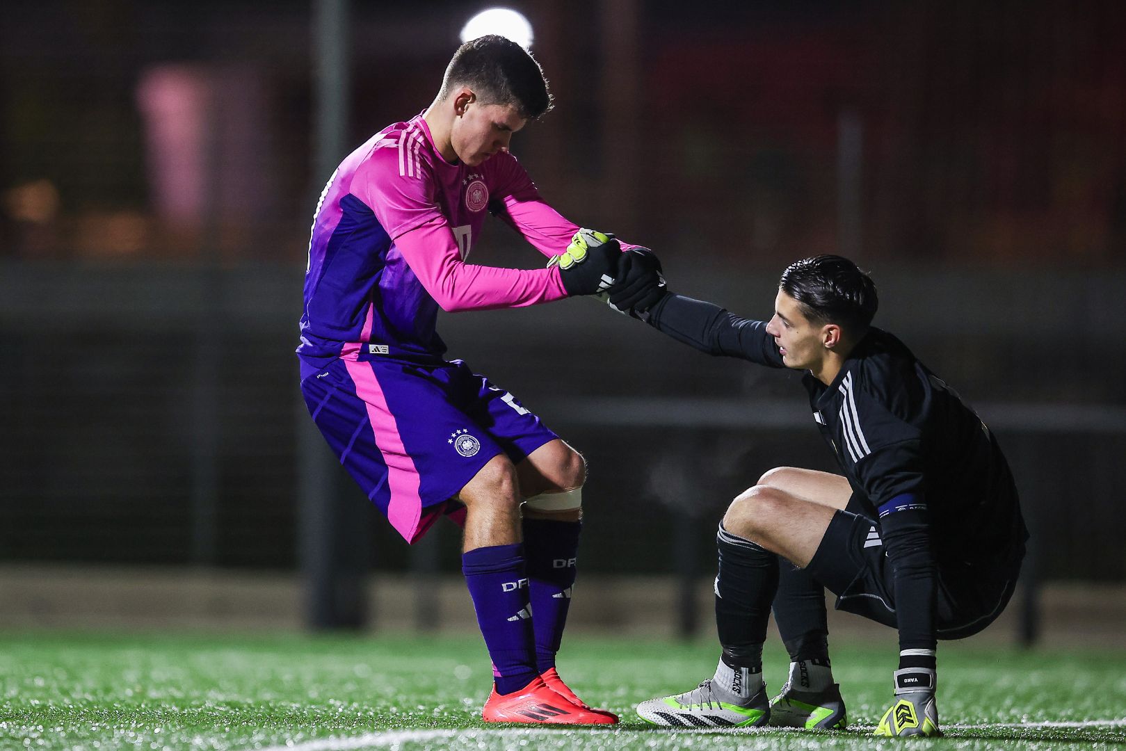 ANDORRA LA VELLA, ANDORRA - NOVEMBER 18: Robert Ramsak of Germany shake hands with Aron Yaakobishvili of Hungaryduring the UEFA Under19 EURO Qualifier between Hungary U19 and Germany U19 at Centre d'Entrenament FAF Santa Coloma on November 18, 2024 in Andorra la Vella, Andorra.