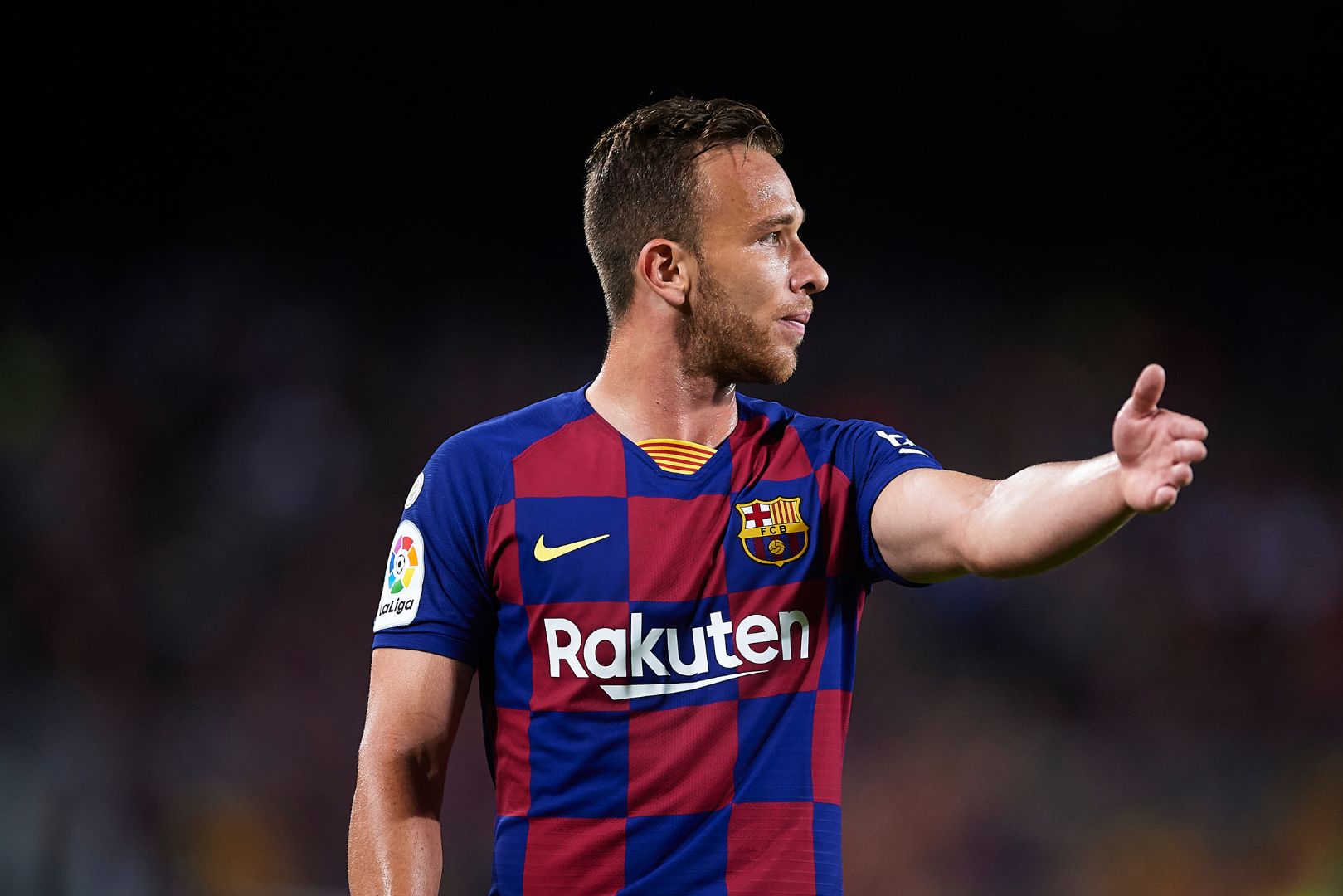BARCELONA, SPAIN - OCTOBER 06: Arthur Melo of FC Barcelona looks on during the Liga match between FC Barcelona and Sevilla FC at Camp Nou on October 06, 2019 in Barcelona, Spain.
