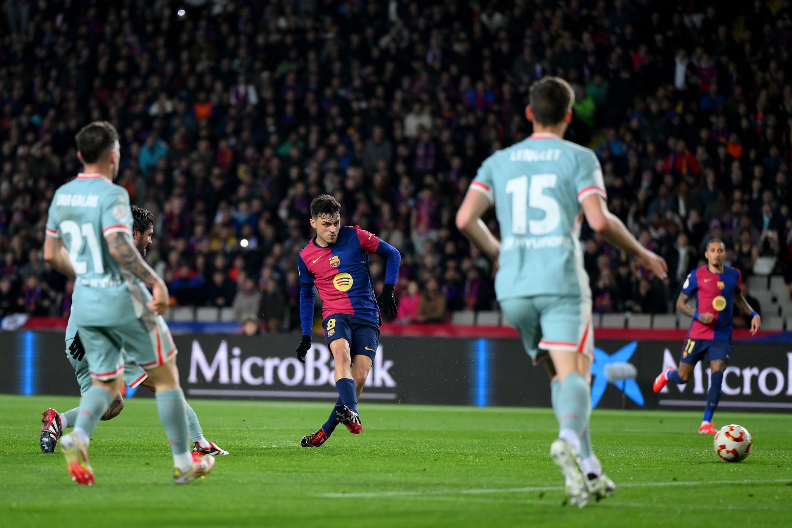 BARCELONA, SPAIN - FEBRUARY 25: Pedri of FC Barcelona scores his team's first goal during the Copa del Rey Semi Final match between FC Barcelona and Atletico de Madrid at Estadi Olimpic Lluis Companys on February 25, 2025 in Barcelona, Spain.