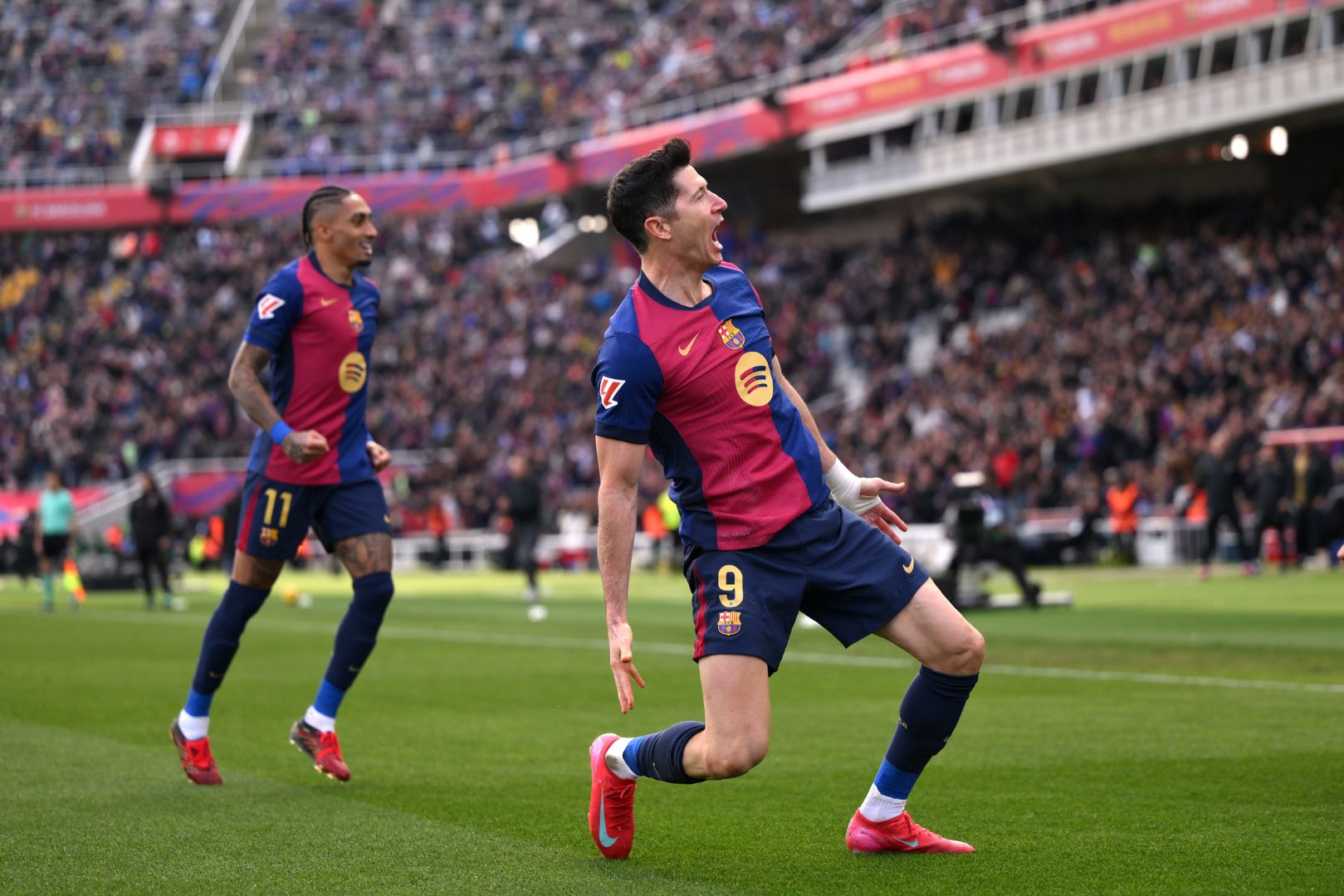 BARCELONA, SPAIN - FEBRUARY 02: Robert Lewandowski of FC Barcelona celebrates scoring his team's first goal during the LaLiga match between FC Barcelona and Deportivo Alaves at Estadi Olimpic Lluis Companys on February 02, 2025 in Barcelona, Spain.