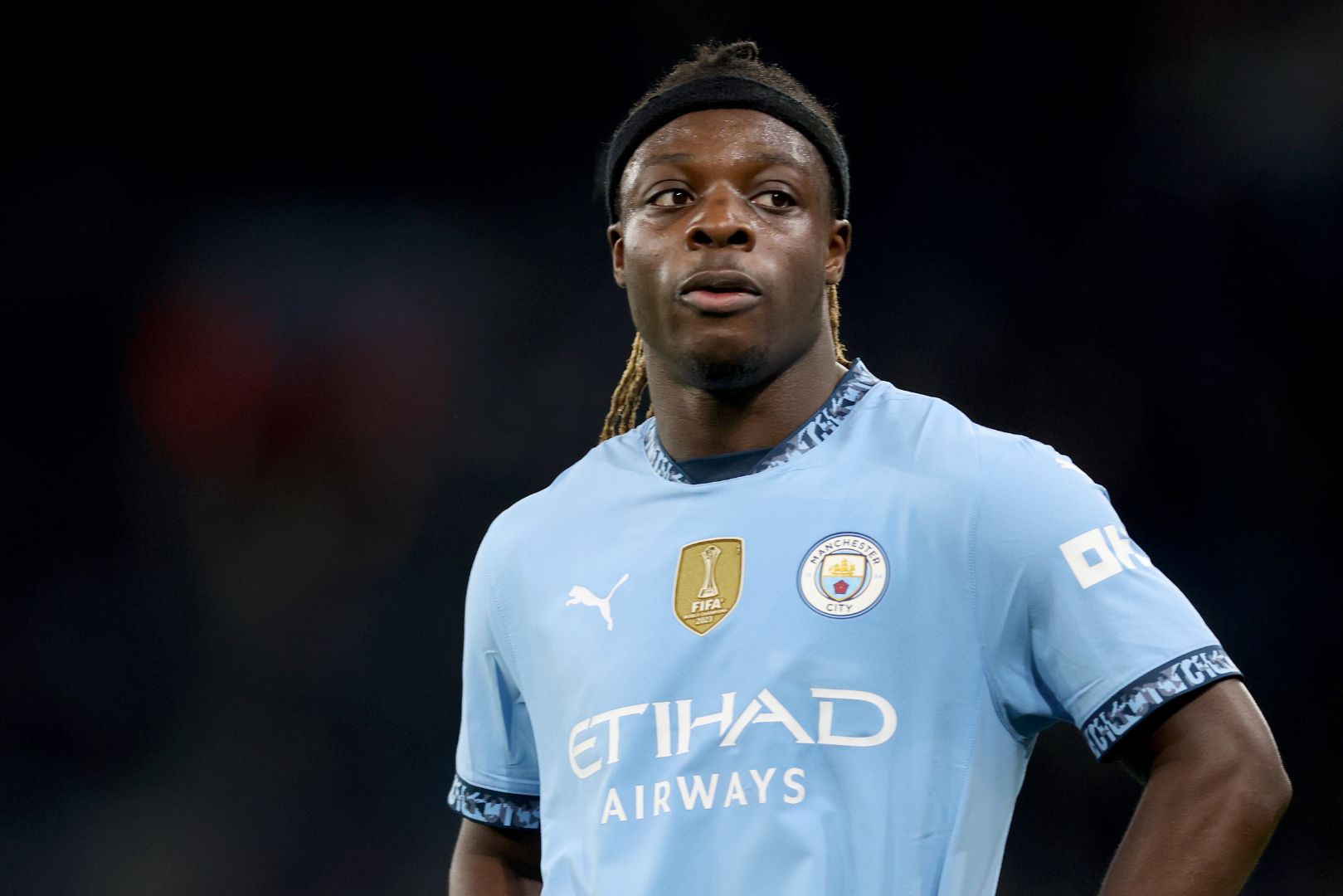 MANCHESTER, ENGLAND - DECEMBER 15: Jeremy Doku of Manchester City during the Premier League match between Manchester City FC and Manchester United FC at Etihad Stadium on December 15, 2024 in Manchester, England.