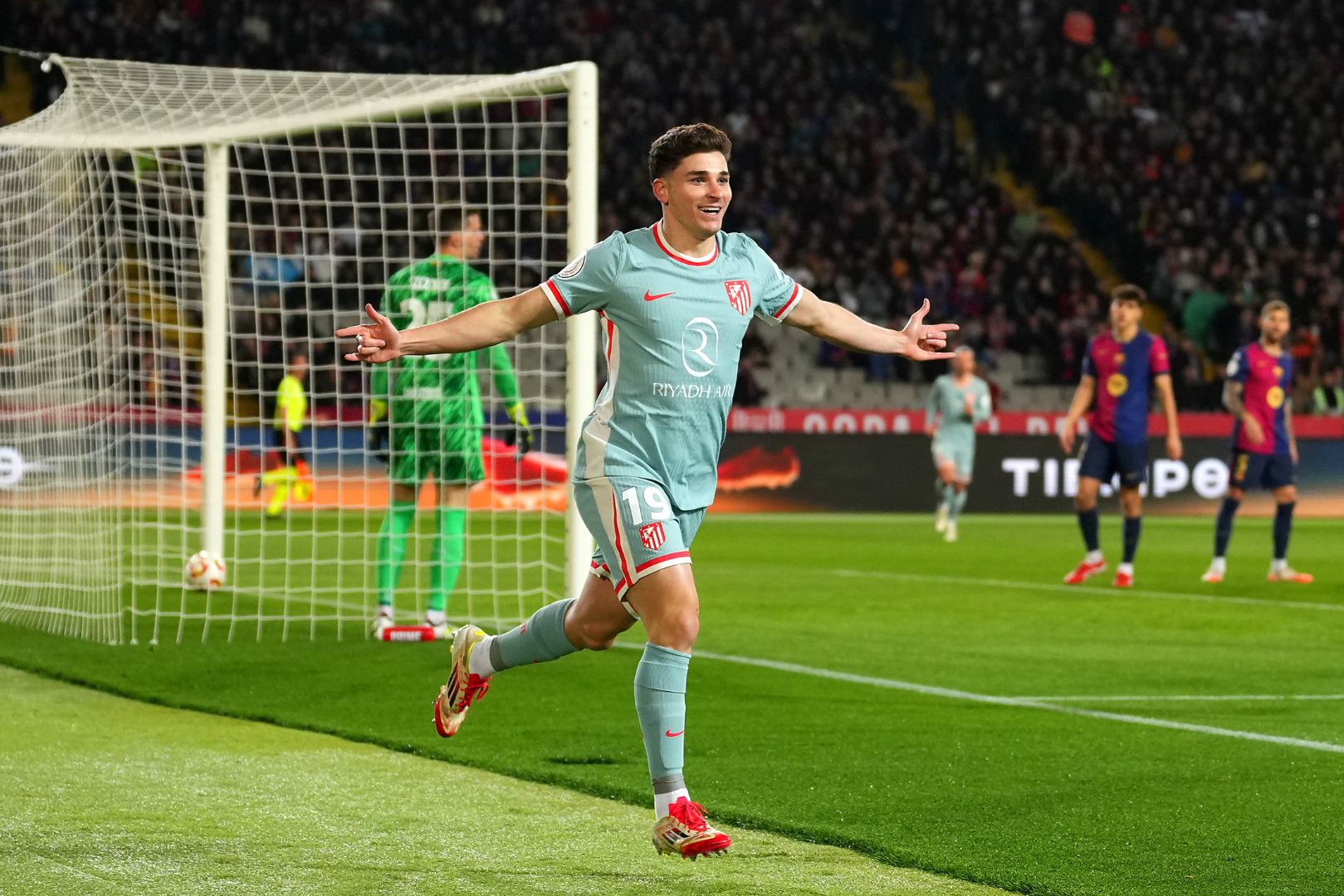 BARCELONA, SPAIN - FEBRUARY 25: Julian Alvarez of Atletico de Madrid celebrates scoring his team's first goal during the Copa del Rey Semi Final match between FC Barcelona and Atletico de Madrid at Estadi Olimpic Lluis Companys on February 25, 2025 in Barcelona, Spain.