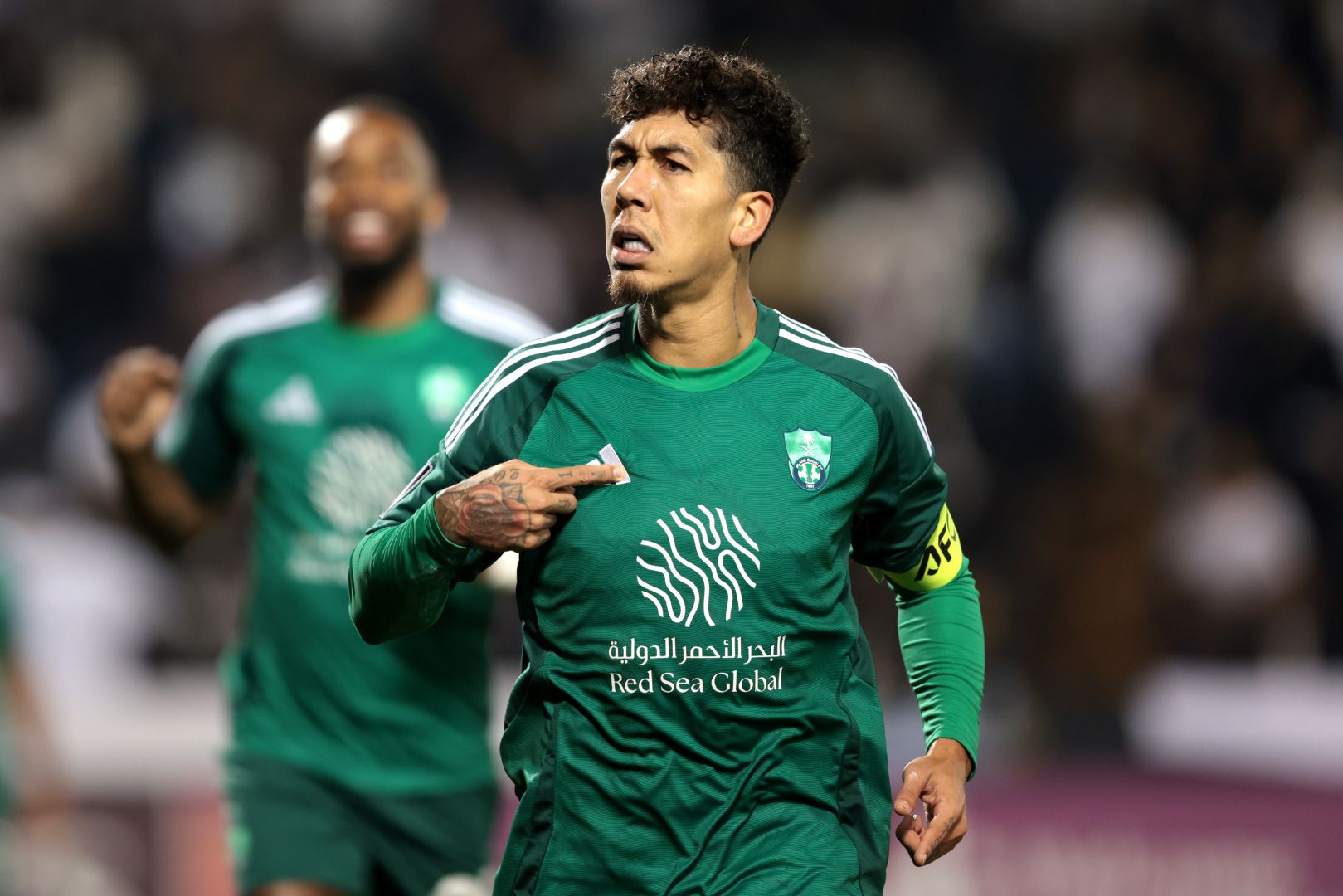 DOHA, QATAR - FEBRUARY 03: Roberto Firmino of Al-Ahli Saudi celebrates scoring his team's first goal during the AFC Champions League Elite match between Al-Sadd and Al-Ahli at Jassim bin Hamad Stadium on February 03, 2025 in Doha, Qatar.