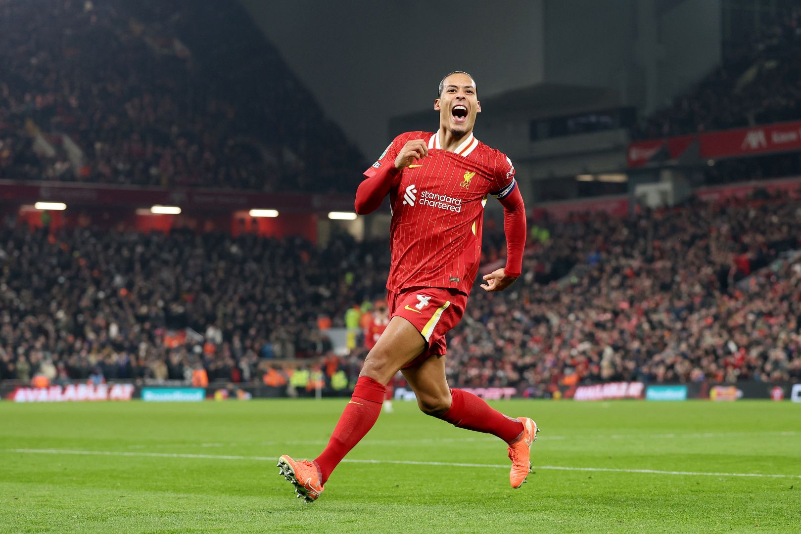 LIVERPOOL, ENGLAND - FEBRUARY 06: Virgil van Dijk of Liverpool celebrates scoring his team's fourth goal during the Carabao Cup Semi Final Second Leg match between Liverpool and Tottenham Hotspur at Anfield on February 06, 2025 in Liverpool, England.