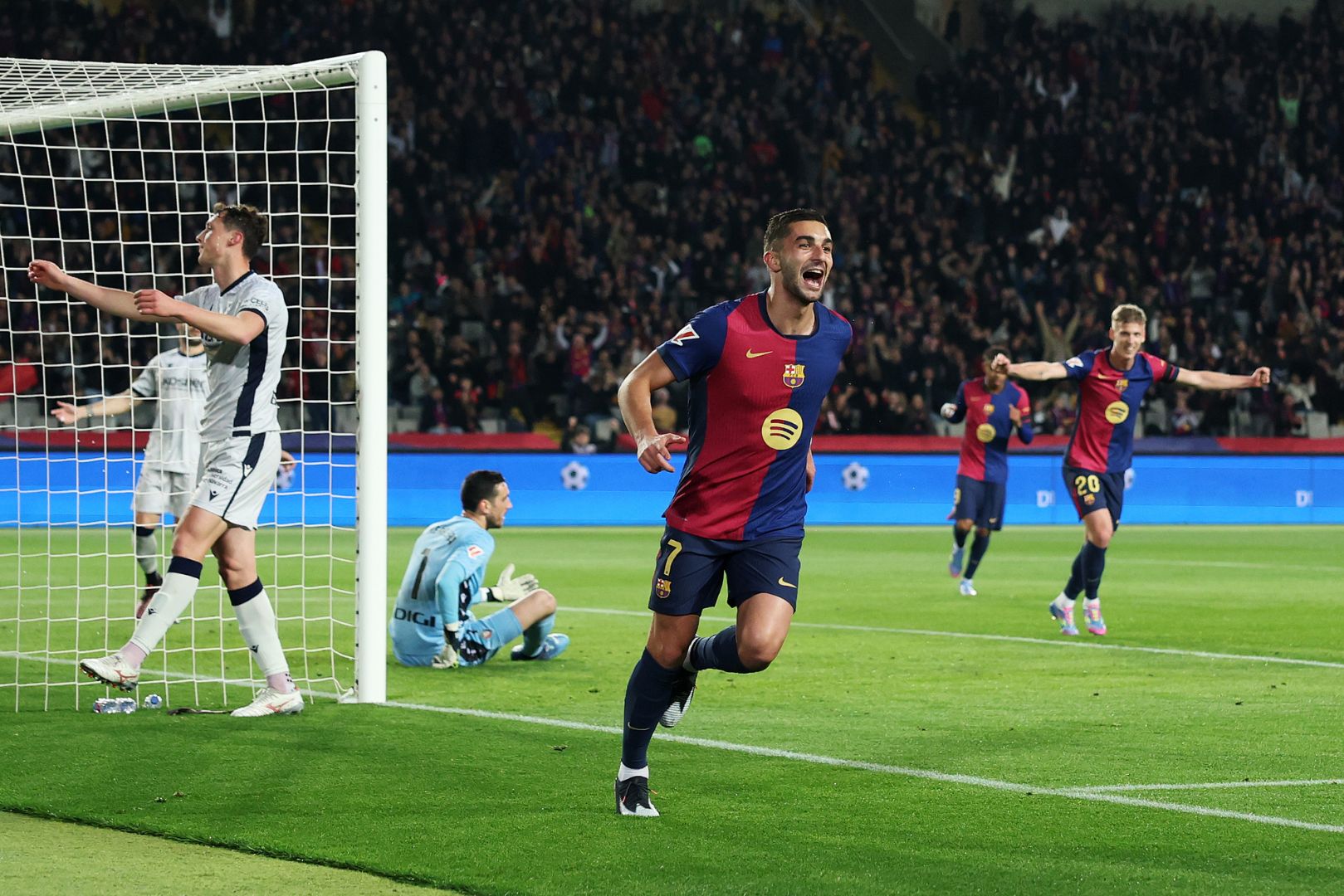 BARCELONA, SPAIN - MARCH 27: Ferran Torres of FC Barcelona celebrates scoring his team's first goal during the La Liga EA Sports match between FC Barcelona and CA Osasuna at Estadi Olimpic Lluis Companys on March 27, 2025 in Barcelona, Spain.