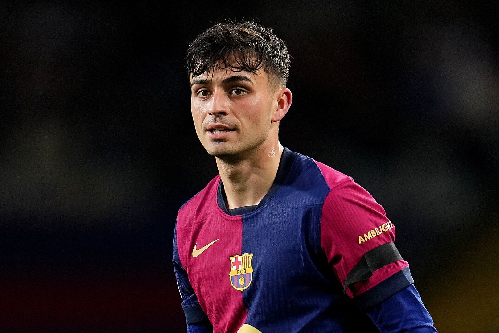BARCELONA, SPAIN - MARCH 11: Pedri of FC Barcelona looks on during the UEFA Champions League 2024/25 UEFA Champions League 2024/25 Round of 16 Second Leg match between FC Barcelona and SL Benfica at on March 11, 2025 in Barcelona, Spain.