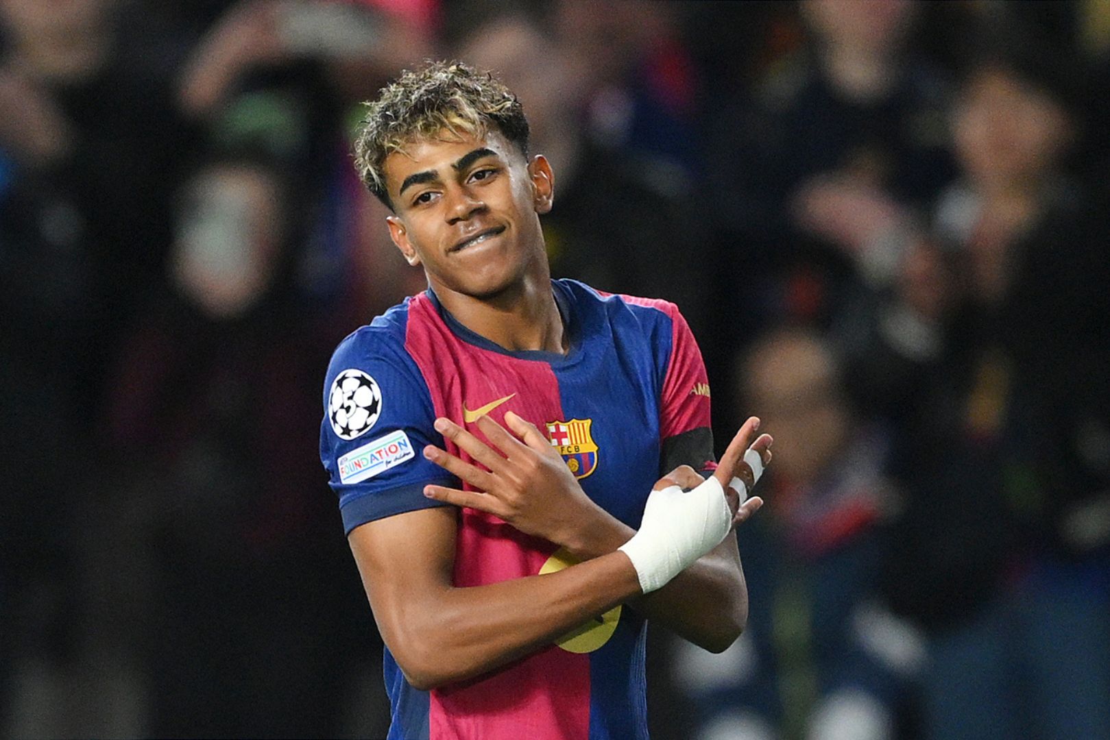 BARCELONA, SPAIN - MARCH 11: Lamine Yamal of FC Barcelona celebrates scoring his team's second goal during the UEFA Champions League 2024/25 UEFA Champions League 2024/25 Round of 16 Second Leg match between FC Barcelona and SL Benfica at Estadi Olímpic Lluís Companys on March 11, 2025 in Barcelona, Spain.