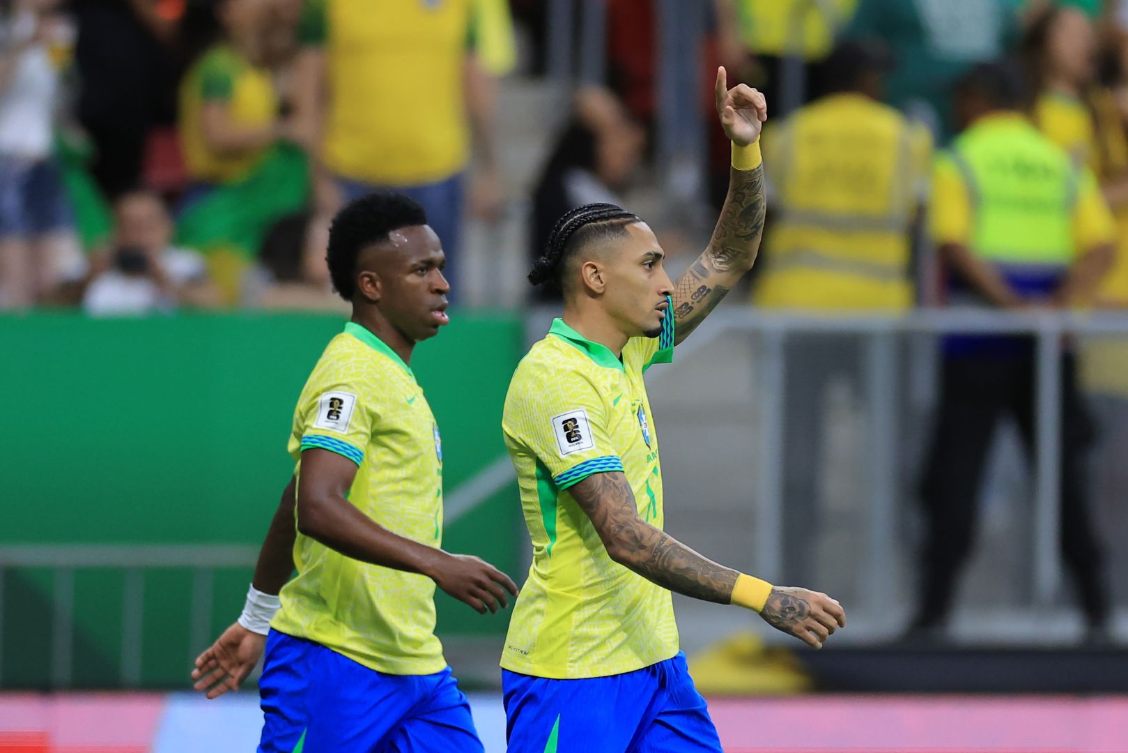 BRASILIA, BRAZIL - MARCH 20: Raphinha of Brazil celebrates after scoring the team's first goal via penalty during the South American FIFA World Cup 2026 Qualifier match between Brazil and Colombia at Mane Garrincha Stadium on March 20, 2025 in Brasilia, Brazil.