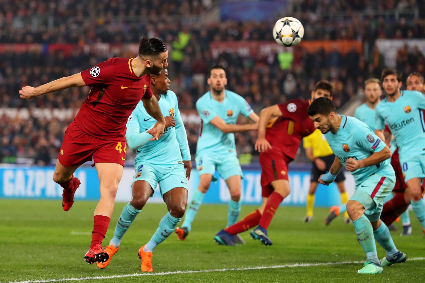 ROME, ITALY - APRIL 10: Kostas Manolas of AS Roma scores his sides third goal during the UEFA Champions League Quarter Final Second Leg match between AS Roma and FC Barcelona at Stadio Olimpico on April 10, 2018 in Rome, Italy.