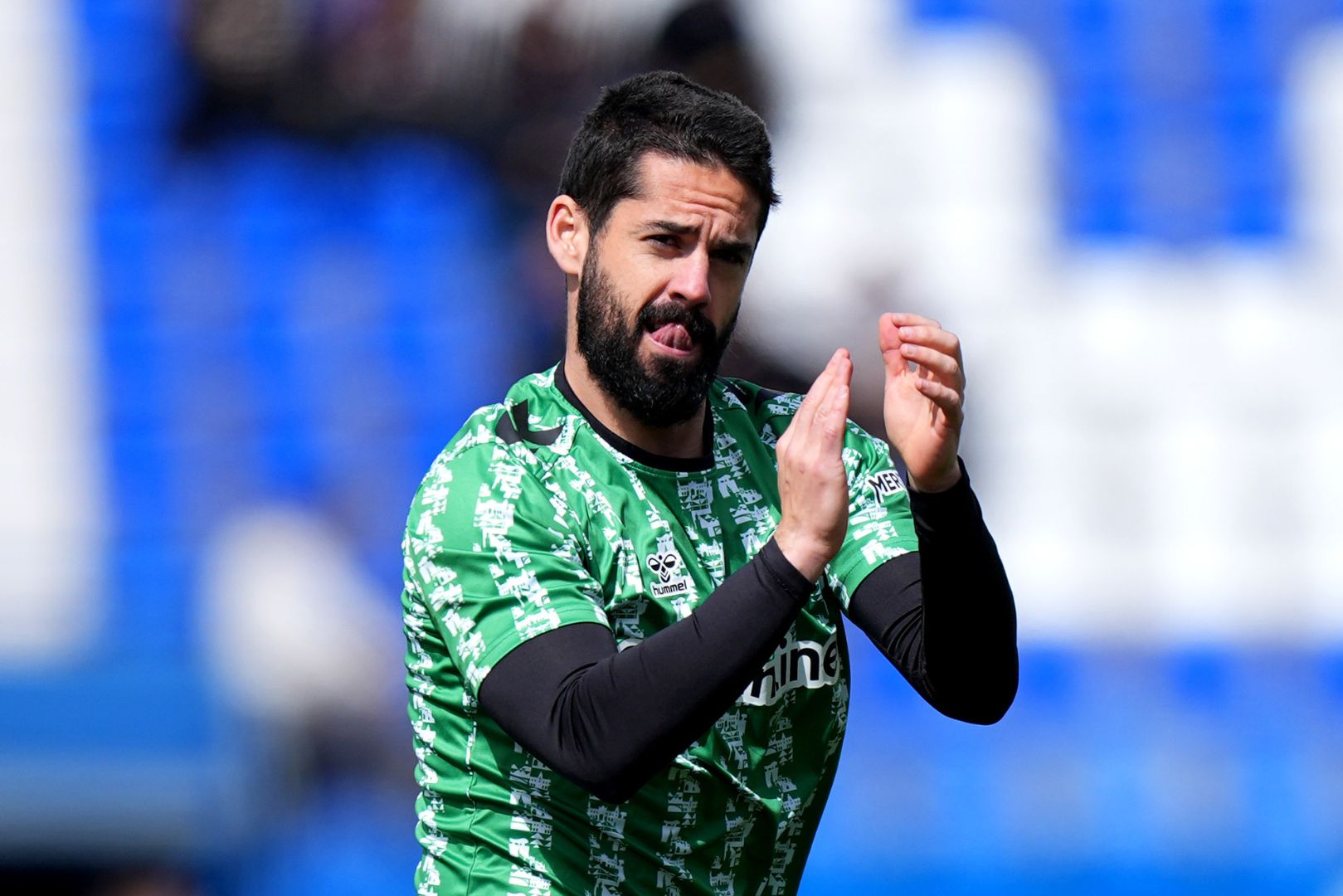 LEGANES, SPAIN - MARCH 16: Isco of Real Betis acknowledges the fans during the warm up prior to the LaLiga match between CD Leganes and Real Betis Balompie at Estadio Municipal de Butarque on March 16, 2025 in Leganes, Spain.
