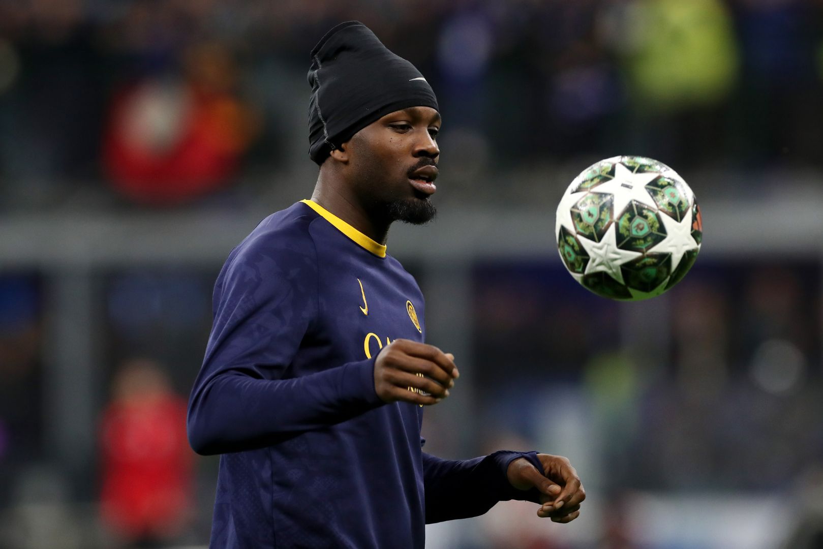 MILAN, ITALY - APRIL 16: Marcus Thuram of FC Internazionale warms up prior to the UEFA Champions League 2024/25 Quarter Final Second Leg match between FC Internazionale Milano and FC Bayern München at San Siro on April 16, 2025 in Milan, Italy.