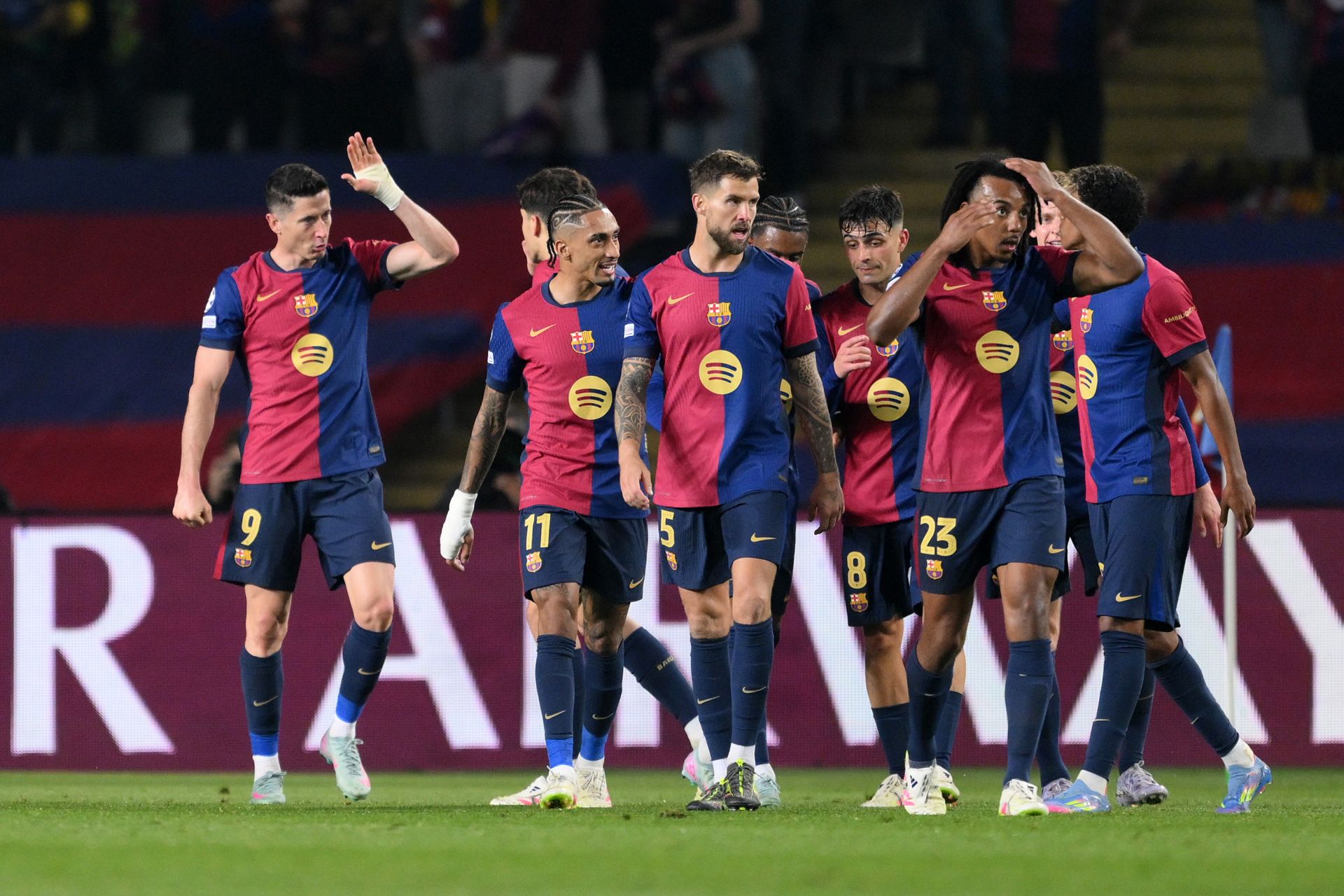 BARCELONA, SPAIN - APRIL 09: Robert Lewandowski of FC Barcelona (L) celebrates scoring his team's third goal with teammates during the UEFA Champions League 2024/25 Quarter Final First Leg match between FC Barcelona and Borussia Dortmund at Estadi Olimpic Lluis Companys on April 09, 2025 in Barcelona, Spain.