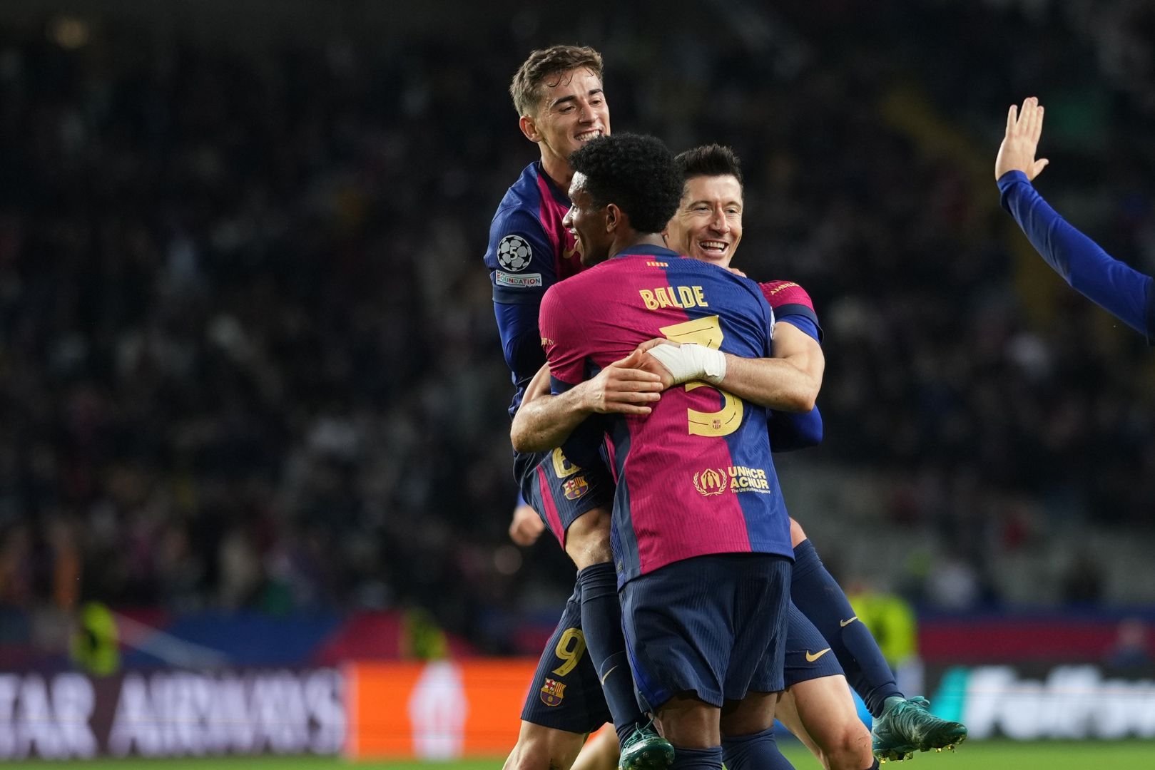 BARCELONA, SPAIN - NOVEMBER 26: Robert Lewandowski of FC Barcelona celebrates scoring his team's third goal with teammates during the UEFA Champions League 2024/25 League Phase MD5 match between FC Barcelona and Stade Brestois 29 at Estadi Olimpic Lluis Companys on November 26, 2024 in Barcelona, Spain.
