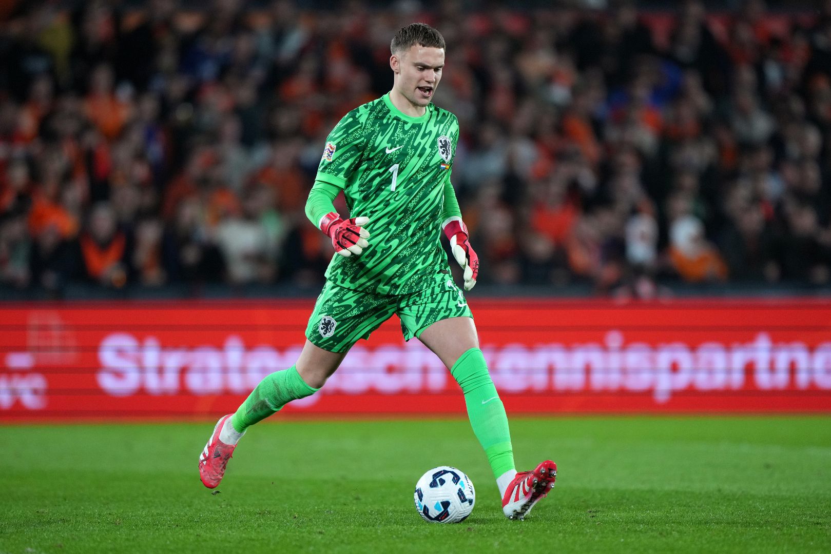 ROTTERDAM, NETHERLANDS - MARCH 20: Bart Verbruggen #1 of the Netherlands kicks the ball in the second half of the UEFA Nations League quarterfinal leg one match between Netherlands and Spain at De Kuip on March 20, 2025 in Rotterdam, Netherlands.