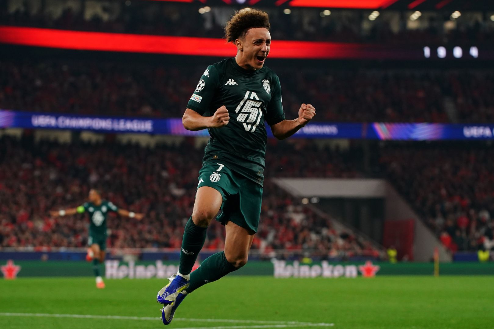 LISBON, PORTUGAL - FEBRUARY 18: Eliesse Ben Seghir of AS Monaco celebrates after scoring a goal during the UEFA Champions League 2024/25 League Knockout Play-off Second Leg match between SL Benfica and AS Monaco at Estadio da Luz on February 18, 2025 in Lisbon, Portugal.