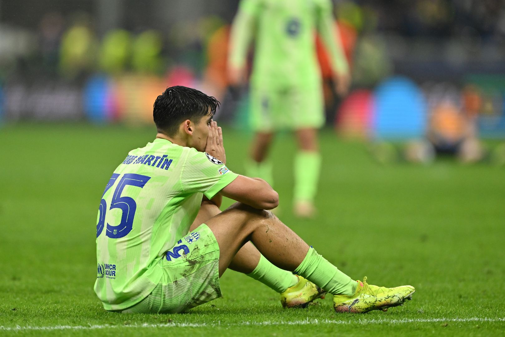 MILAN, ITALY - MAY 06: Gerard Martin of FC Barcelona looks dejected after his team's 4-3 defeat in the UEFA Champions League 2024/25 Semi Final Second Leg match between FC Internazionale Milano and FC Barcelona at Giuseppe Meazza Stadium on May 06, 2025 in Milan, Italy.