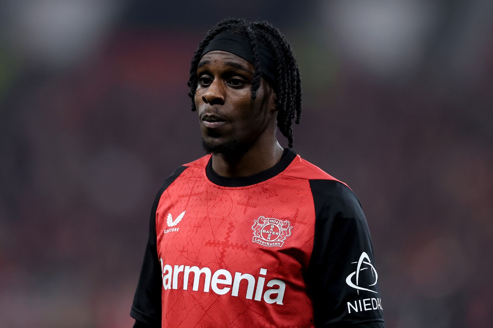 LEVERKUSEN, GERMANY - MARCH 28: Jeremie Frimpong of Bayer 04 Leverkusen looks on during the Bundesliga match between Bayer 04 Leverkusen and VfL Bochum 1848 at BayArena on March 28, 2025 in Leverkusen, Germany.