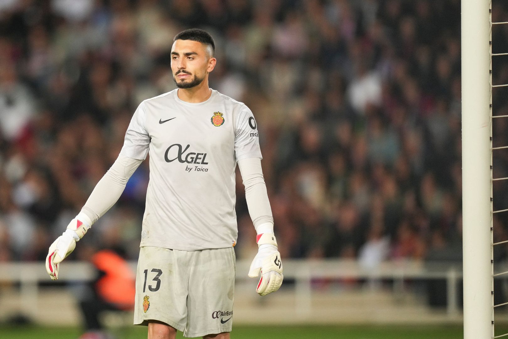 BARCELONA, SPAIN - APRIL 22: Leo Roman of RCD Mallorca reacts during the La Liga EA Sports match between FC Barcelona and RCD Mallorca at Estadi Olimpic Lluis Companys on April 22, 2025 in Barcelona, Spain.