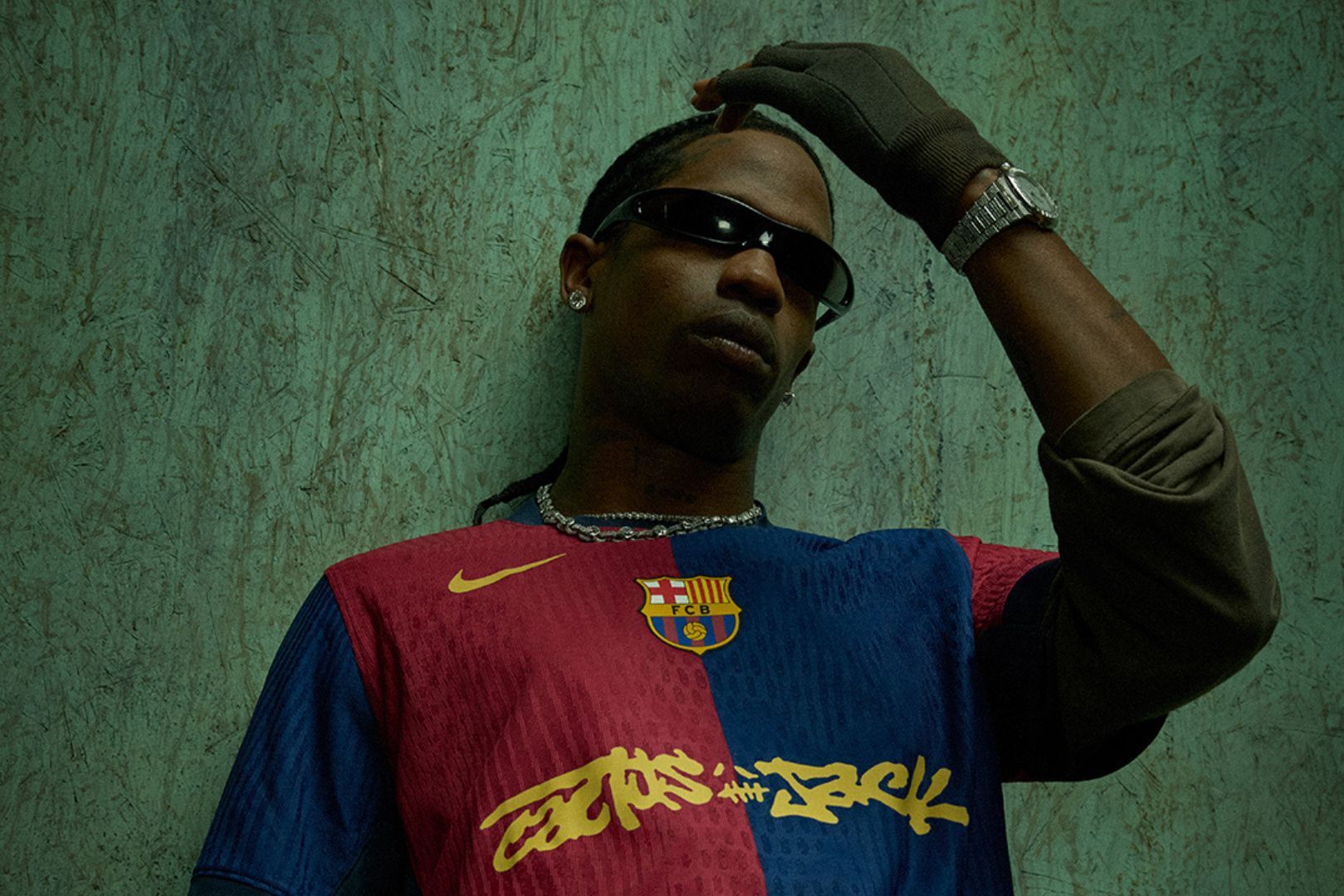 Travis Scott Wears Special Barcelona Jersey Featuring His Logo for El Clásico
