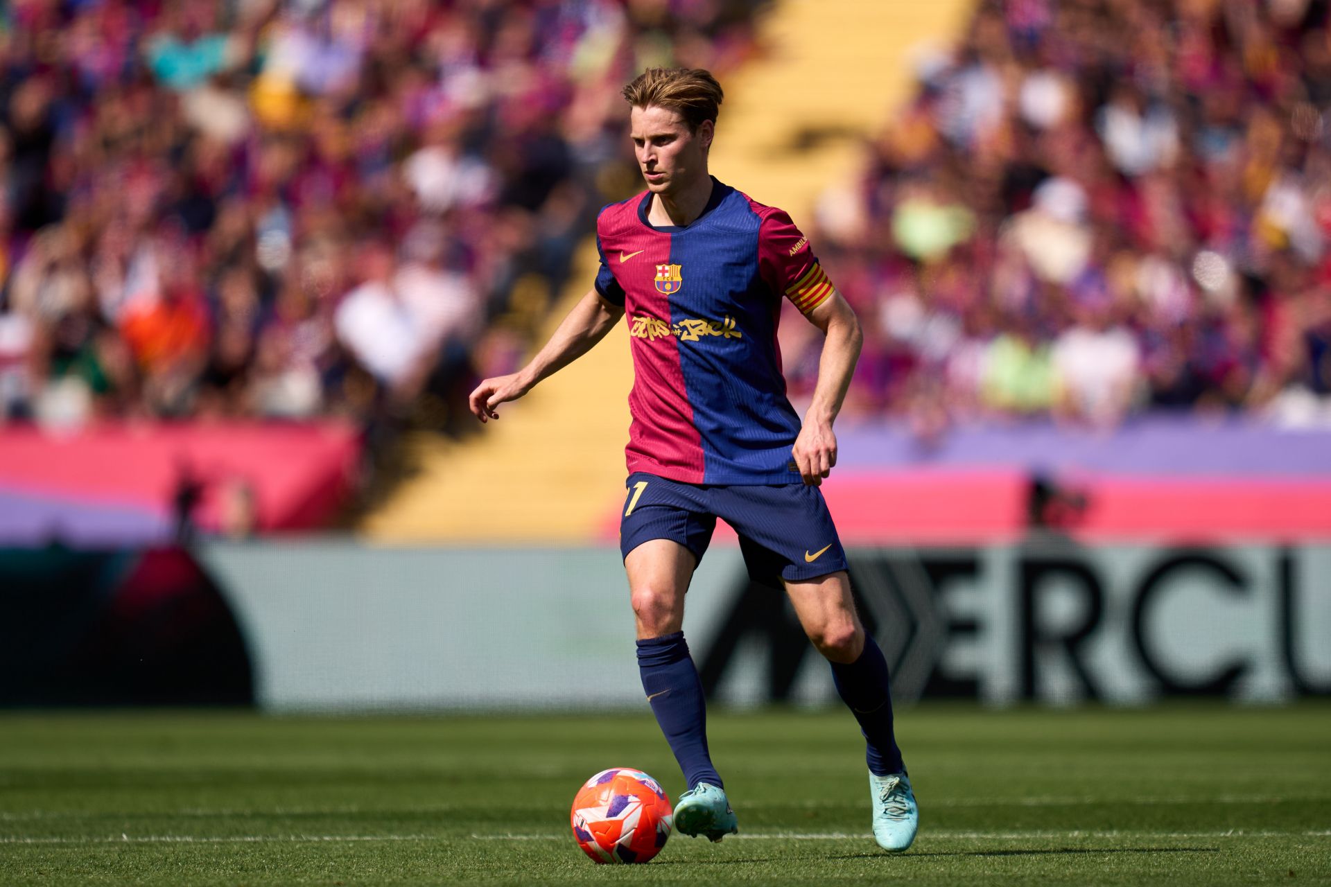 BARCELONA, SPAIN - MAY 11: Frenkie De Jong of FC Barcelona runs with the ball during the LaLiga match between FC Barcelona and Real Madrid CF at Estadi Olimpic Lluis Companys on May 11, 2025 in Barcelona, Spain.