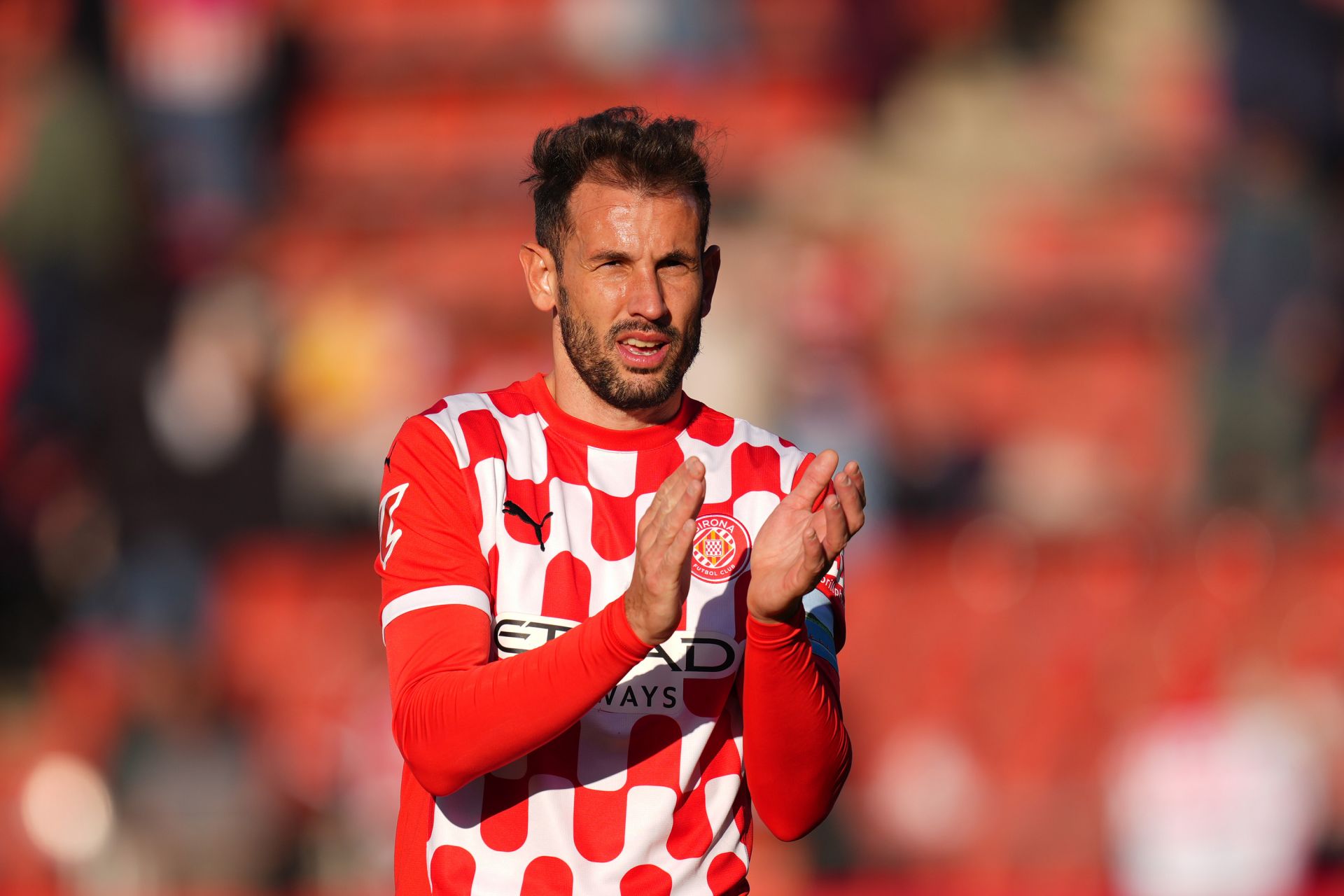 GIRONA, SPAIN - JANUARY 18: Cristhian Stuani of Girona FC acknowledges the fans after the LaLiga match between Girona FC and Sevilla FC at Montilivi Stadium on January 18, 2025 in Girona, Spain.