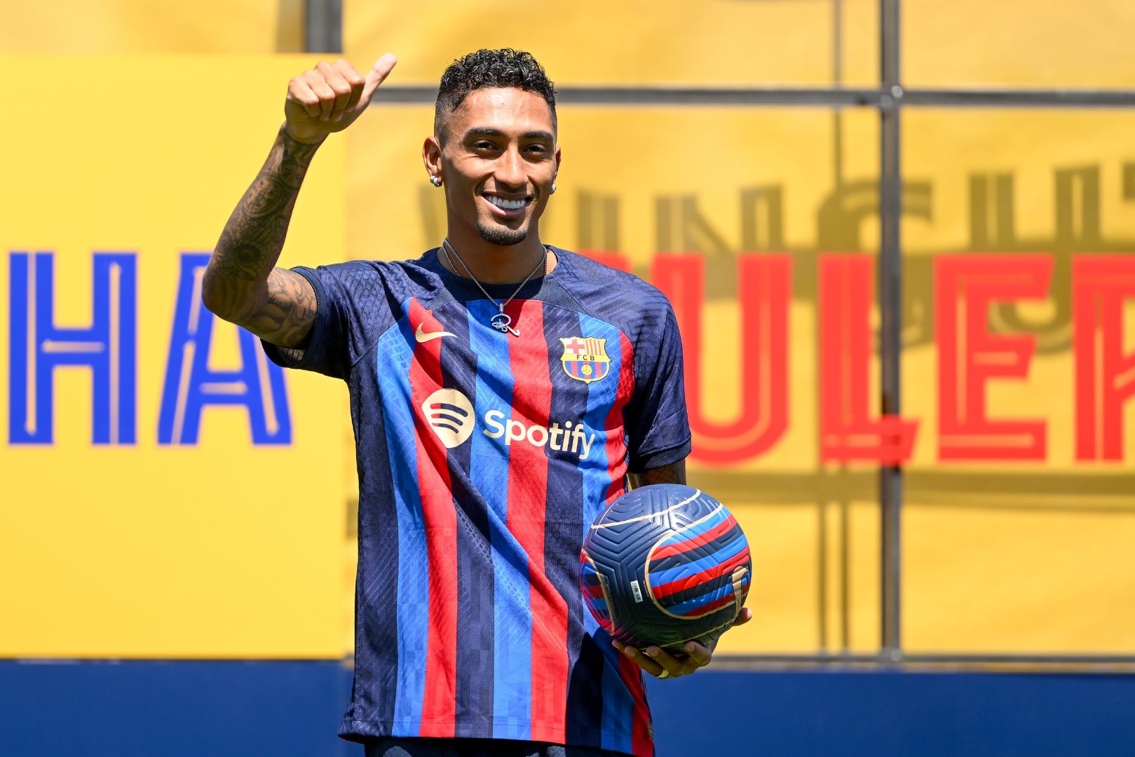 SANT JOAN DESPI, SPAIN - JULY 15: Raphael Dias Belloli 'Raphinha' poses for the media as he is presented as a FC Barcelona player at Ciutat Esportiva Joan Gamper on July 15, 2022 in Sant Joan Despi, Spain.