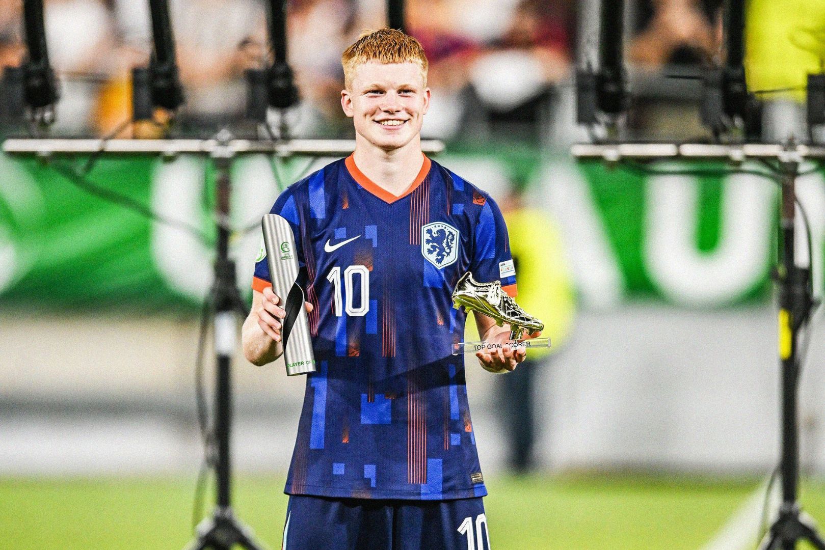 Kees Smit posing with UEFA European Under-19 Championship Award.