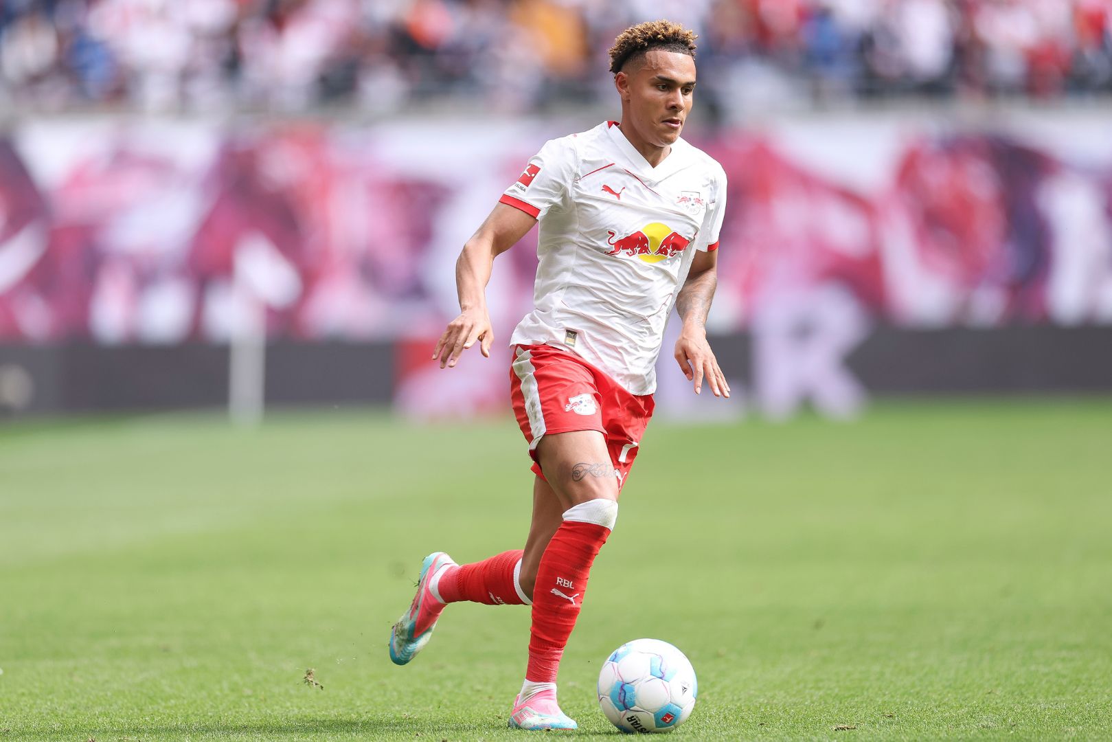 LEIPZIG, GERMANY - MAY 17: Antonio Nusa of RB Leipzig controls the ball during the Bundesliga match between RB Leipzig and VfB Stuttgart at Red Bull Arena on May 17, 2025 in Leipzig, Germany.