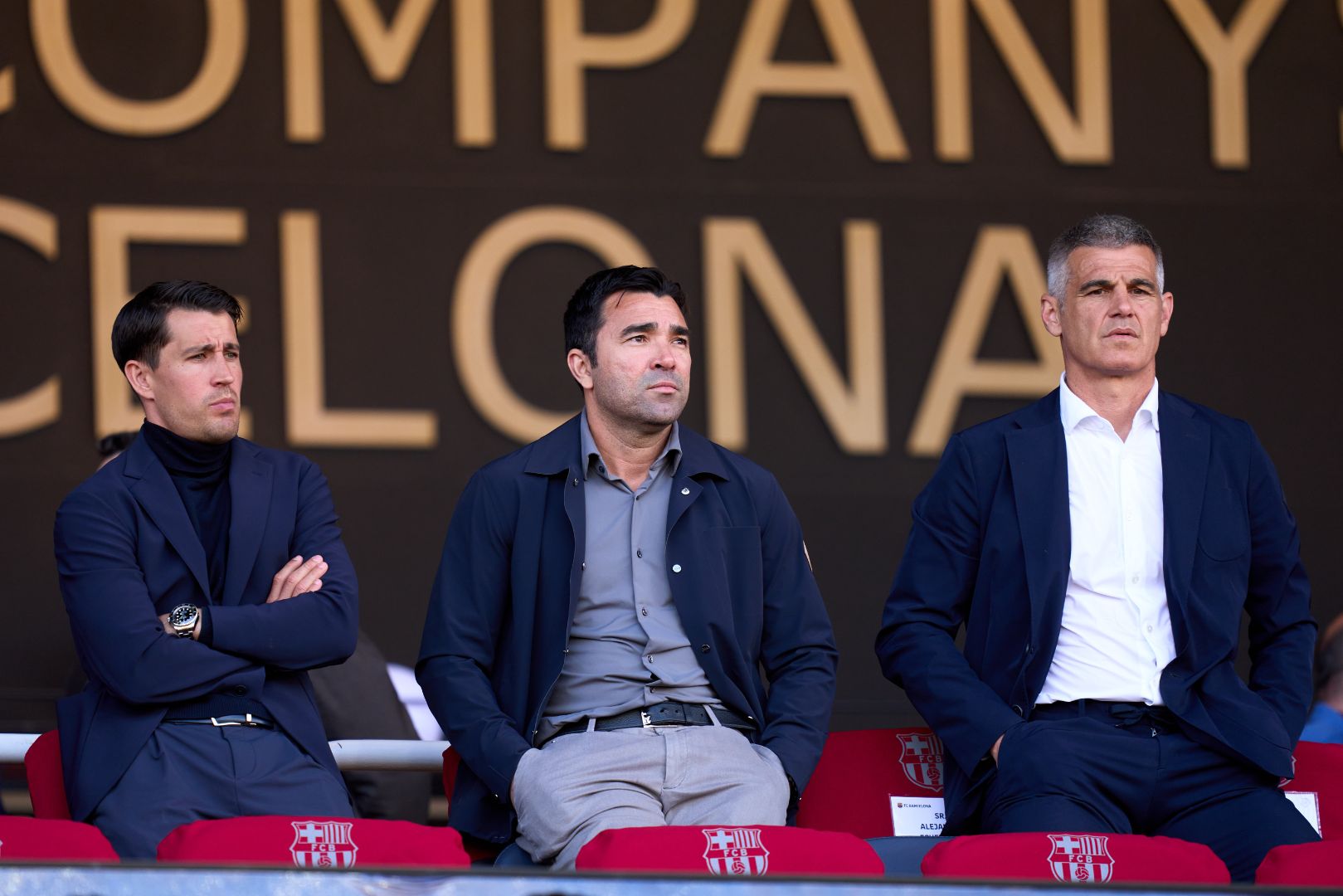 BARCELONA, SPAIN - MAY 11: (L-R) FC Barcelona Football Coordinator Bojan Krkic, FC Barcelona Director of Football Anderson Luis de Souza 'Deco' and FC Barcelona President Advisor Enric Masip look on from the presidential box prior to the LaLiga match between FC Barcelona and Real Madrid CF at Estadi Olimpic Lluis Companys on May 11, 2025 in Barcelona, Spain.