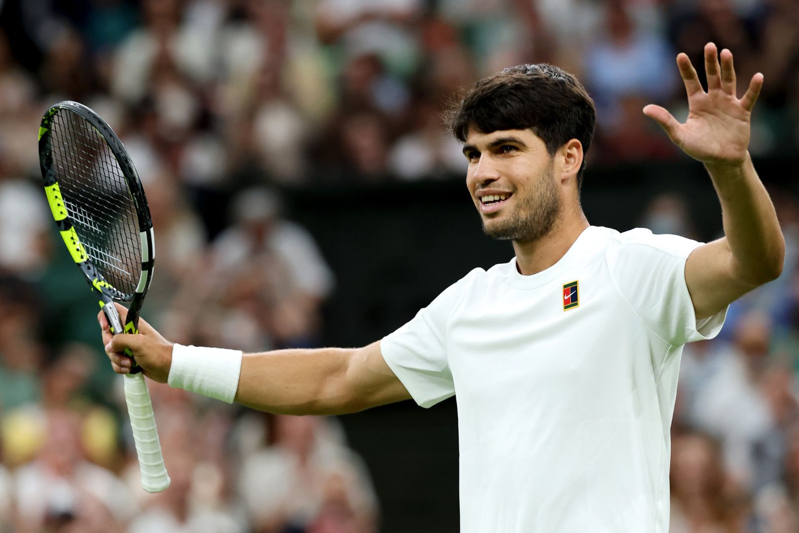 LONDON, ENGLAND - JULY 06: Carlos Alcaraz of Spain celebrates winning match point against Andrey Rublev during the Gentlemen's Singles fourth round match on day seven of The Championships Wimbledon 2025 at All England Lawn Tennis and Croquet Club on July 06, 2025 in London, England.