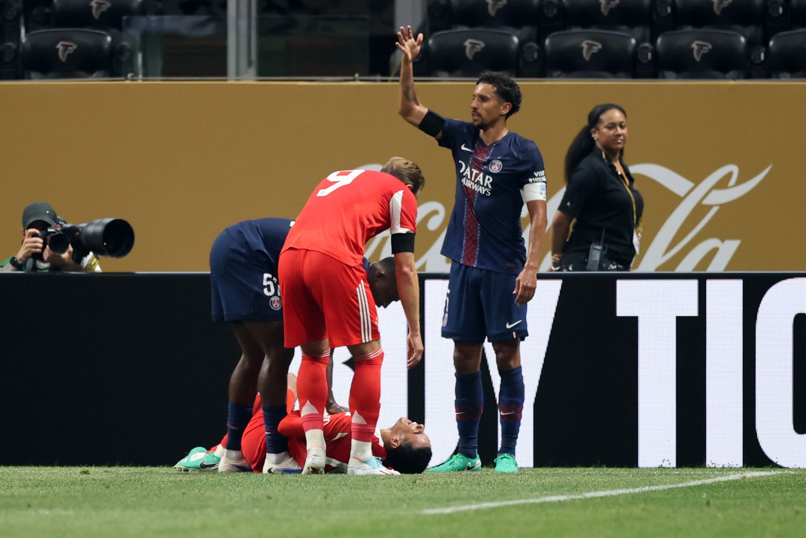 ATLANTA, GEORGIA - JULY 05: Marquinhos #5 of Paris Saint-Germain reacts after Jamal Musiala #42 is injured during the FIFA Club World Cup 2025 quarter-final match between Paris Saint-Germain and FC Bayern München at Mercedes-Benz Stadium on July 05, 2025 in Atlanta, Georgia.