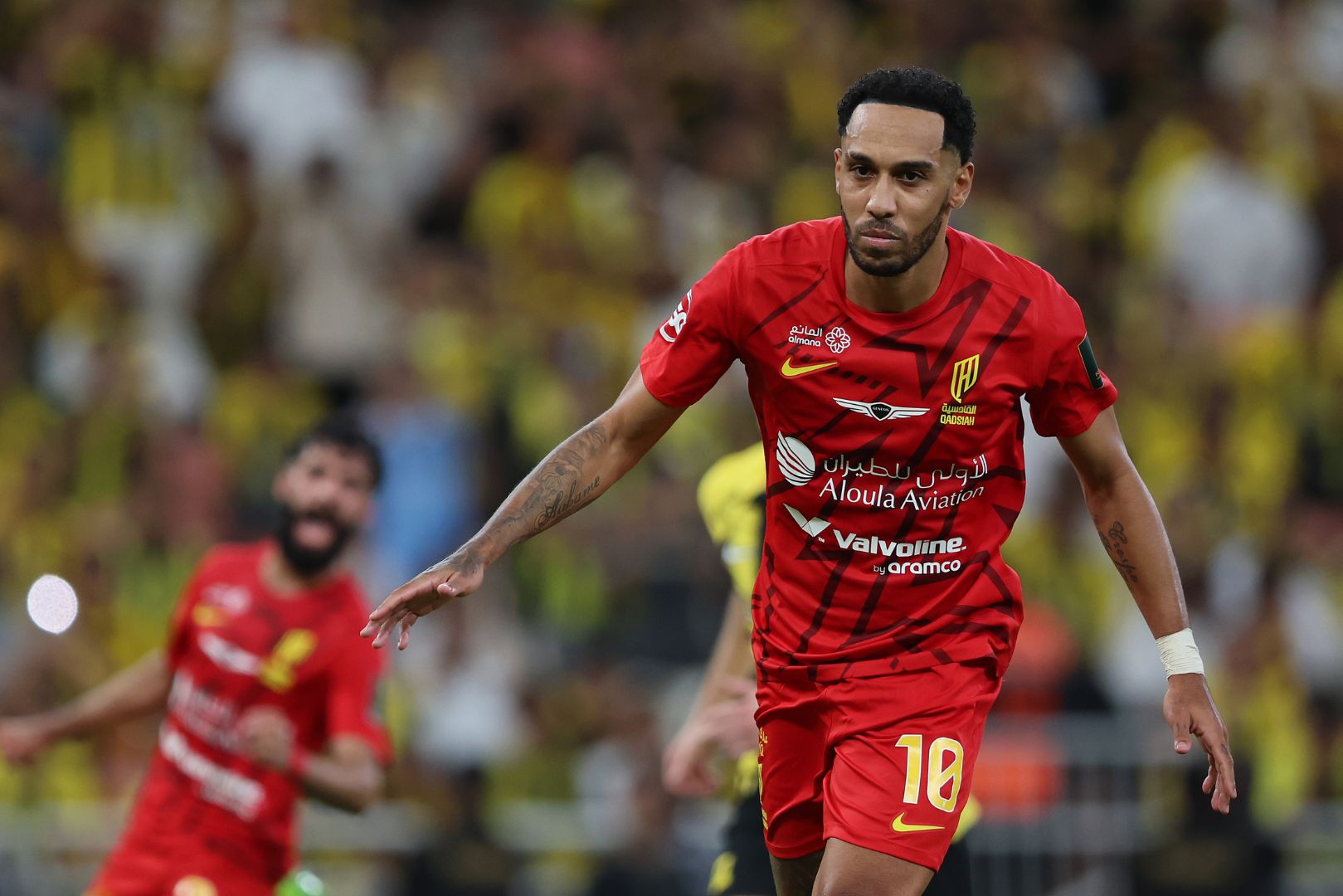 JEDDAH, SAUDI ARABIA - MAY 30: Pierre-Emerick Aubameyang of Al-Qadisiyah celebrates scoring his team's first goal from the penalty spot during the Final King's Cup match between Al Ittihad and Al Qadsiah at King Abdullah Sports City on May 30, 2025 in Jeddah, Saudi Arabia.