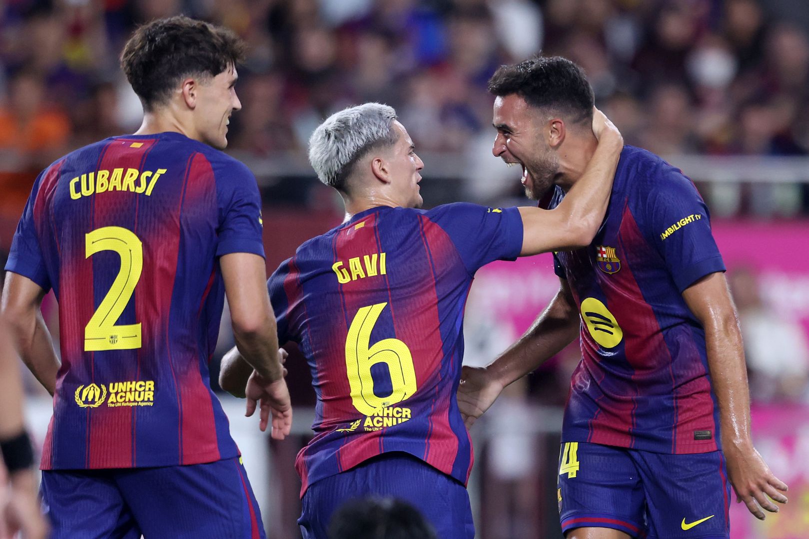 KOBE, JAPAN - JULY 27: FC Barcelona's Eric Garcia (R) is congratulated by Gavi (C) after scoring a goal during the preseason friendly between Vissel Kobe and FC Barcelona at Noevir Stadium Kobe on July 27, 2025 in Kobe, Hyogo, Japan.