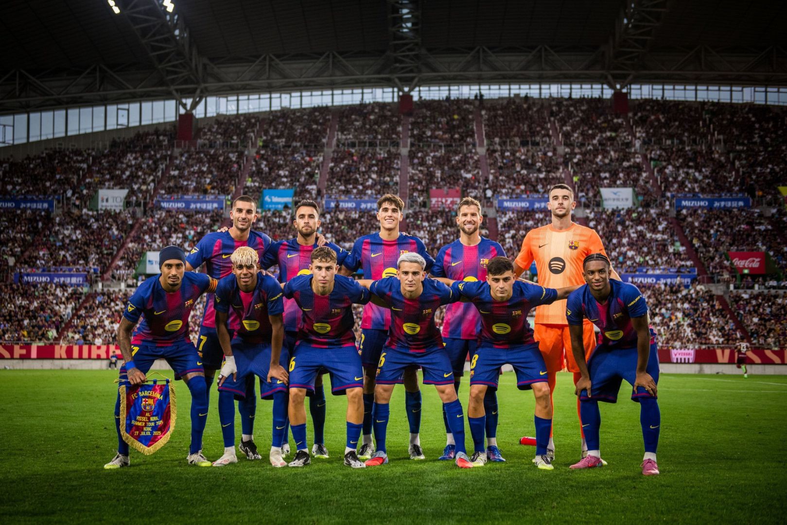 KOBE, JAPAN - JULY 27: FC Barcelona's players pose for a photograph before the preseason friendly between Vissel Kobe and FC Barcelona at Noevir Stadium Kobe on July 27, 2025 in Kobe, Hyogo, Japan.