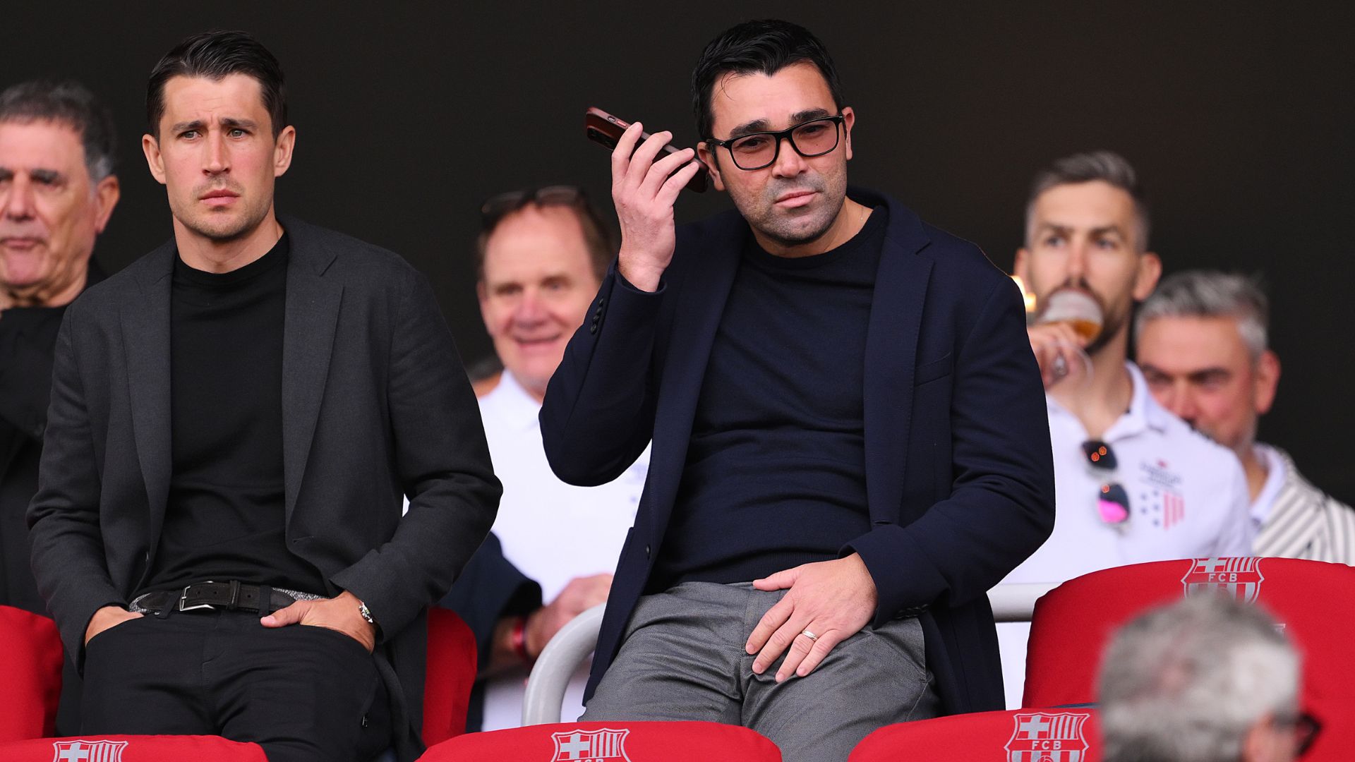 Bojan Krkić and Deco, sporting director of FC Barcelona look on prior to the LaLiga EA Sports match between FC Barcelona and Rayo Vallecano at Estadi Olimpic Lluis Companys.