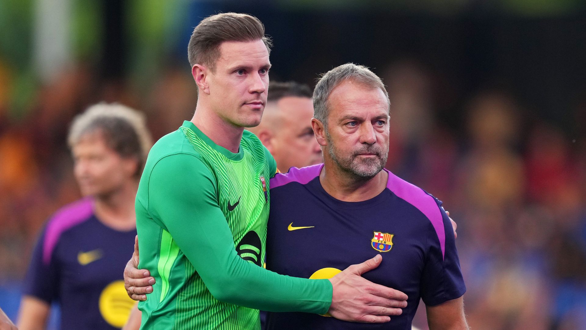 Marc-Andre Ter Stegen of FC Barcelona embraces Hansi Flick, Head Coach of FC Barcelona prior to the Joan Gamper Trophy match between FC Barcelona and Como1907 at Estadi Johan Cruyff.