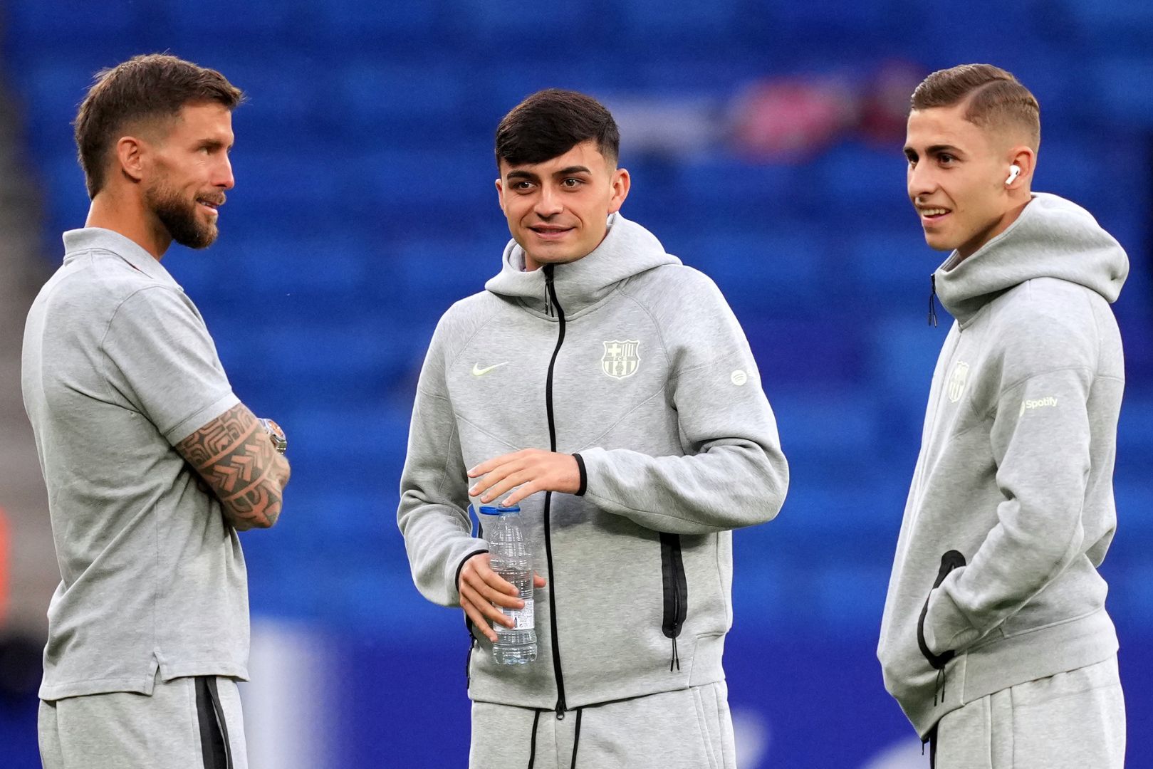 BARCELONA, SPAIN - MAY 15: Inigo Martinez, Pedri and Fermin Lopez of FC Barcelona inspect the pitch prior to the LaLiga match between RCD Espanyol de Barcelona and FC Barcelona at RCDE Stadium on May 15, 2025 in Barcelona, Spain.